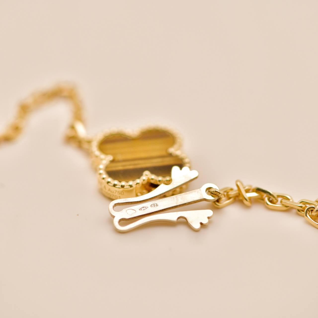 Van Cleef & Arpels Magic Alhambra 16 Motif Carnelian Tiger's Eye Necklace For Sale 2