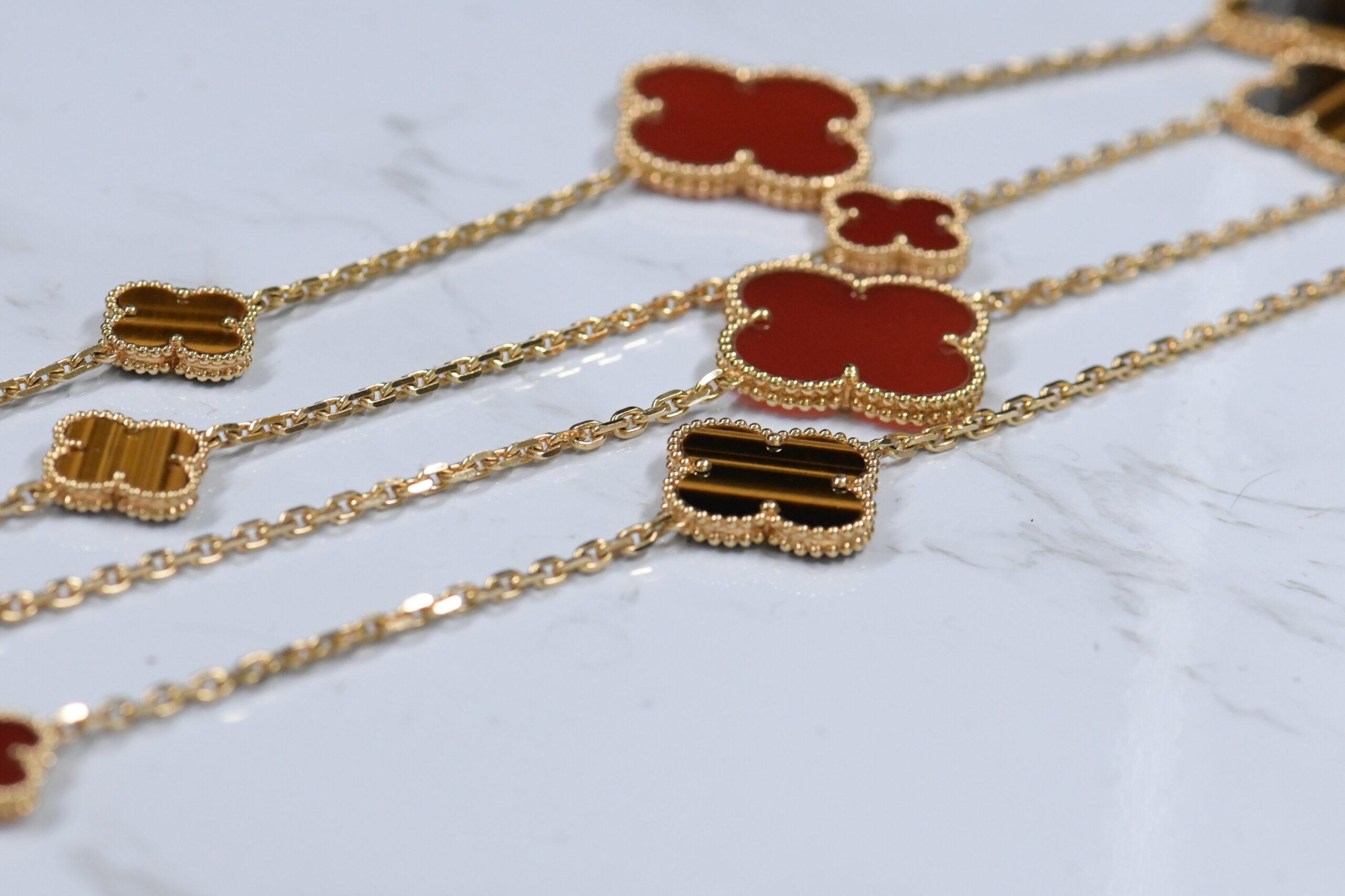 Van Cleef & Arpels Magic Alhambra 16 Motifs Tiger Eye and Carnelian Long Necklac In Excellent Condition In Banbury, GB