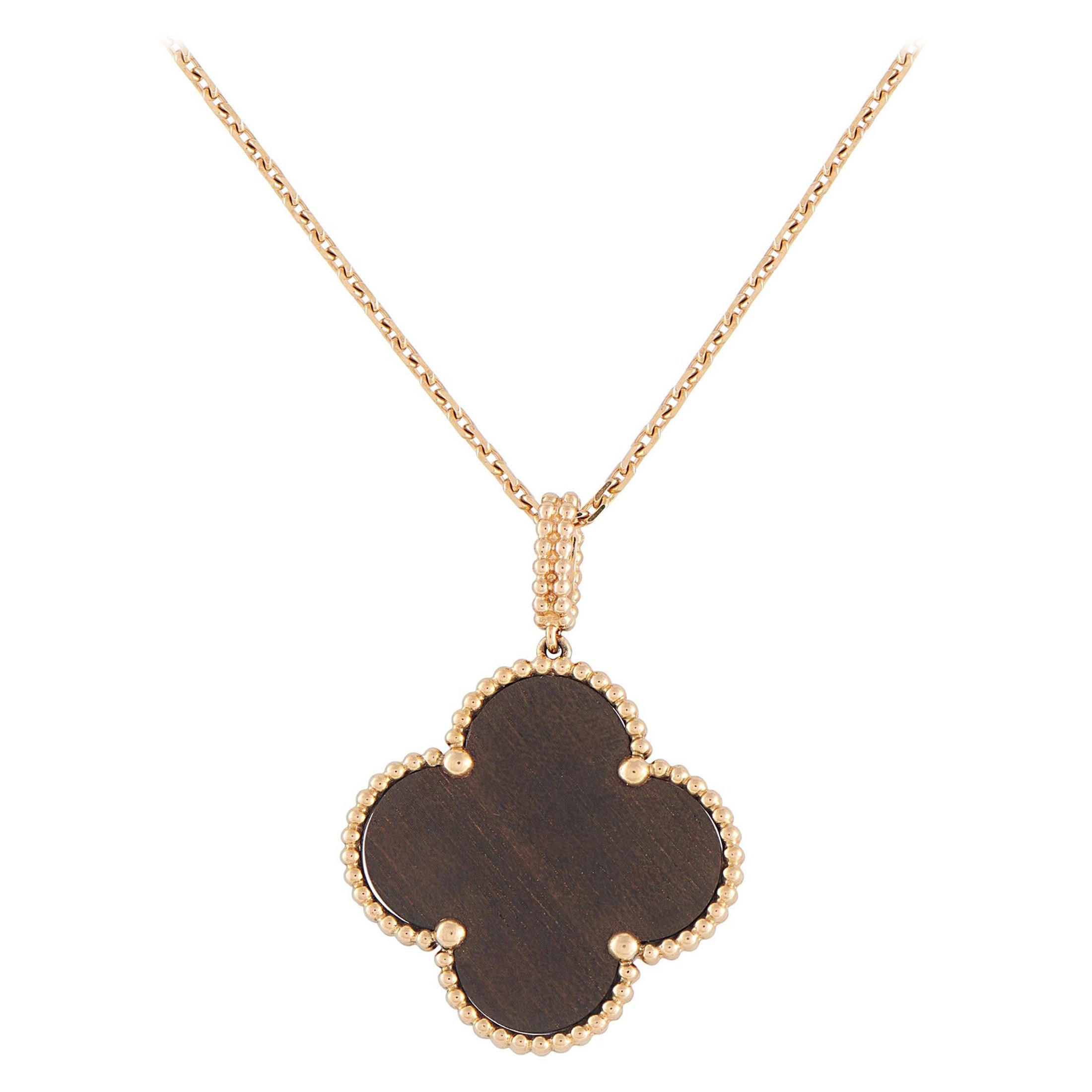 Van Cleef
Arpels Magic Alhambra 18K Rose Gold Pendant Necklace #4935