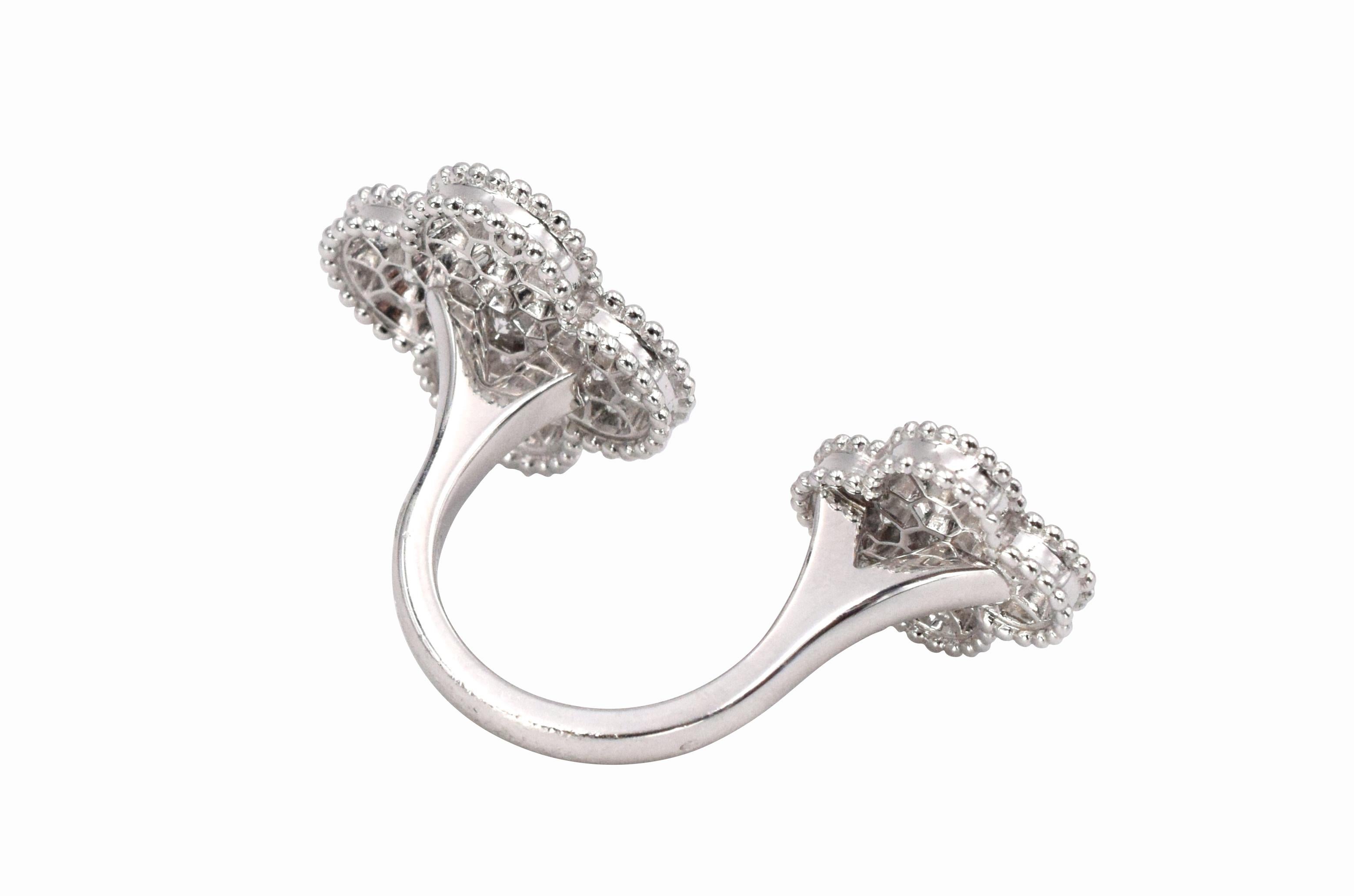 Van Cleef & Arpels Magic Alhambra Between Fingers Ring. This ring has approximately 1.6ct of round brilliant cut diamonds all set in 18k white gold. Signed VCA, Au750, JE123212. Finger size 52.