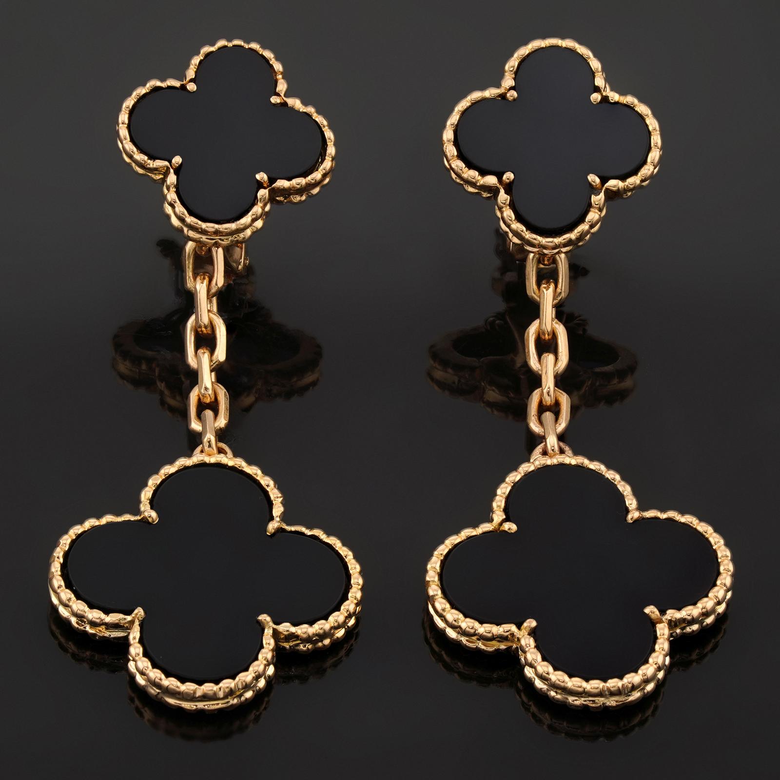These gorgeous Van Cleef & Arpels 2-motif drop earrings from the iconic Magic Alhambra collection are crafted in 18k yellow gold and feature lucky clover motifs inlaid with black onyx in round bead settings. Made in France circa 1990s. Measurements: