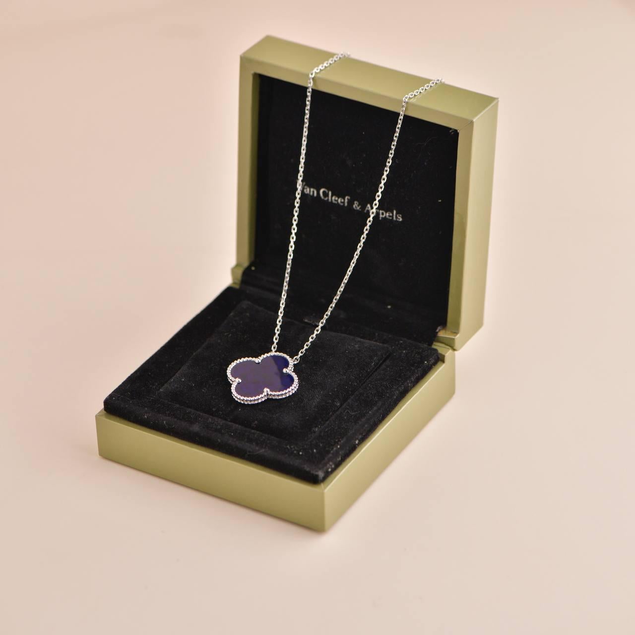 *Rare Find* Introducing the Van Cleef & Arpels Magic Alhambra Blue Sevres Porcelain White Gold Necklace, a rare and exquisite piece from 2012. This elegant necklace features a stunning blue Sevres porcelain motif with a diameter of 2 cm, set in