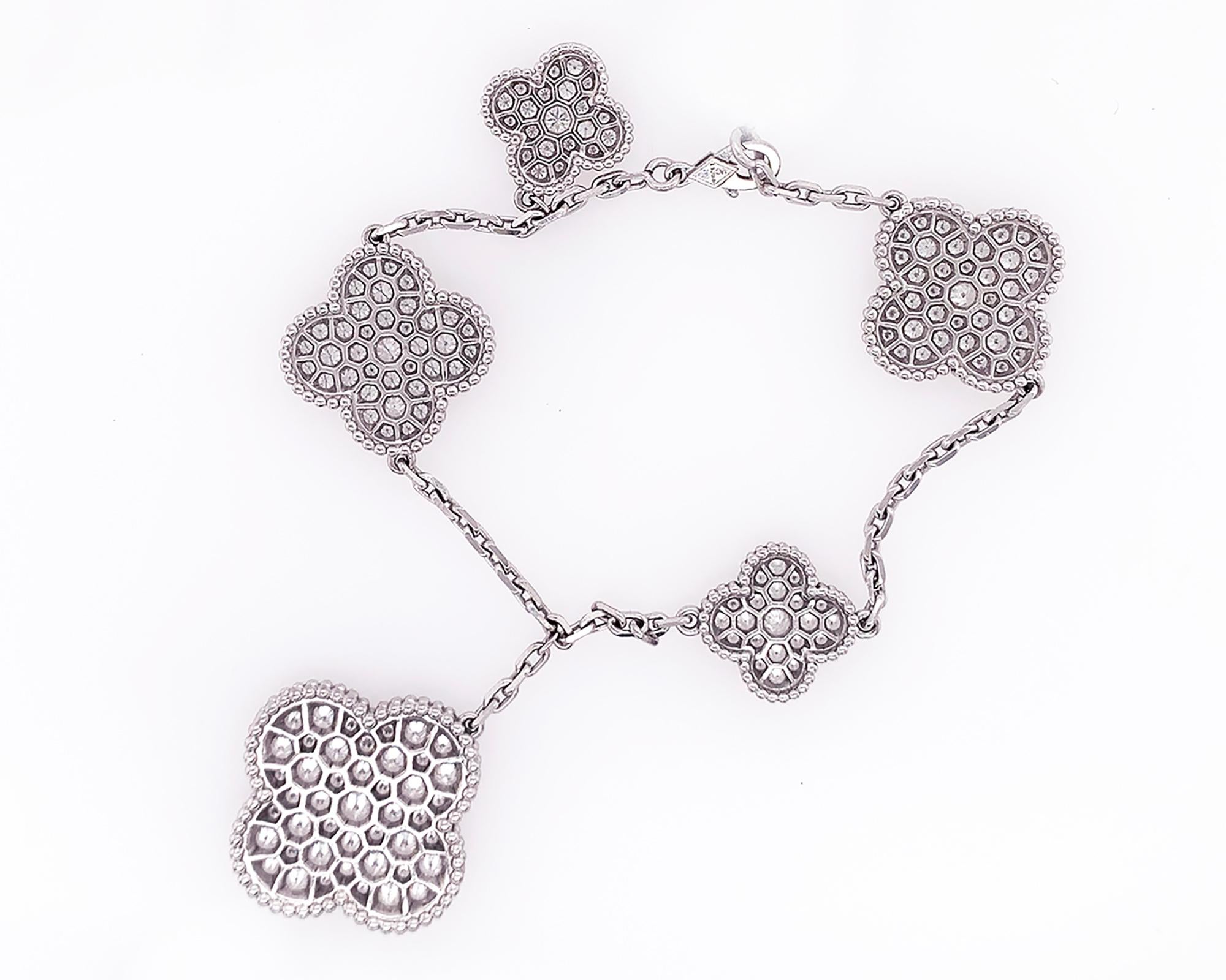 A beautiful bracelet from the Magic Alhambra collection created by Van Cleef & Arpels.
The bracelet features 5 motifs, approximately 5.64 carats of diamonds of DEF colors, IF-VVS clarity.
Hallmark clasp. 18K white gold.
Bracelet wrist size is 7.48
