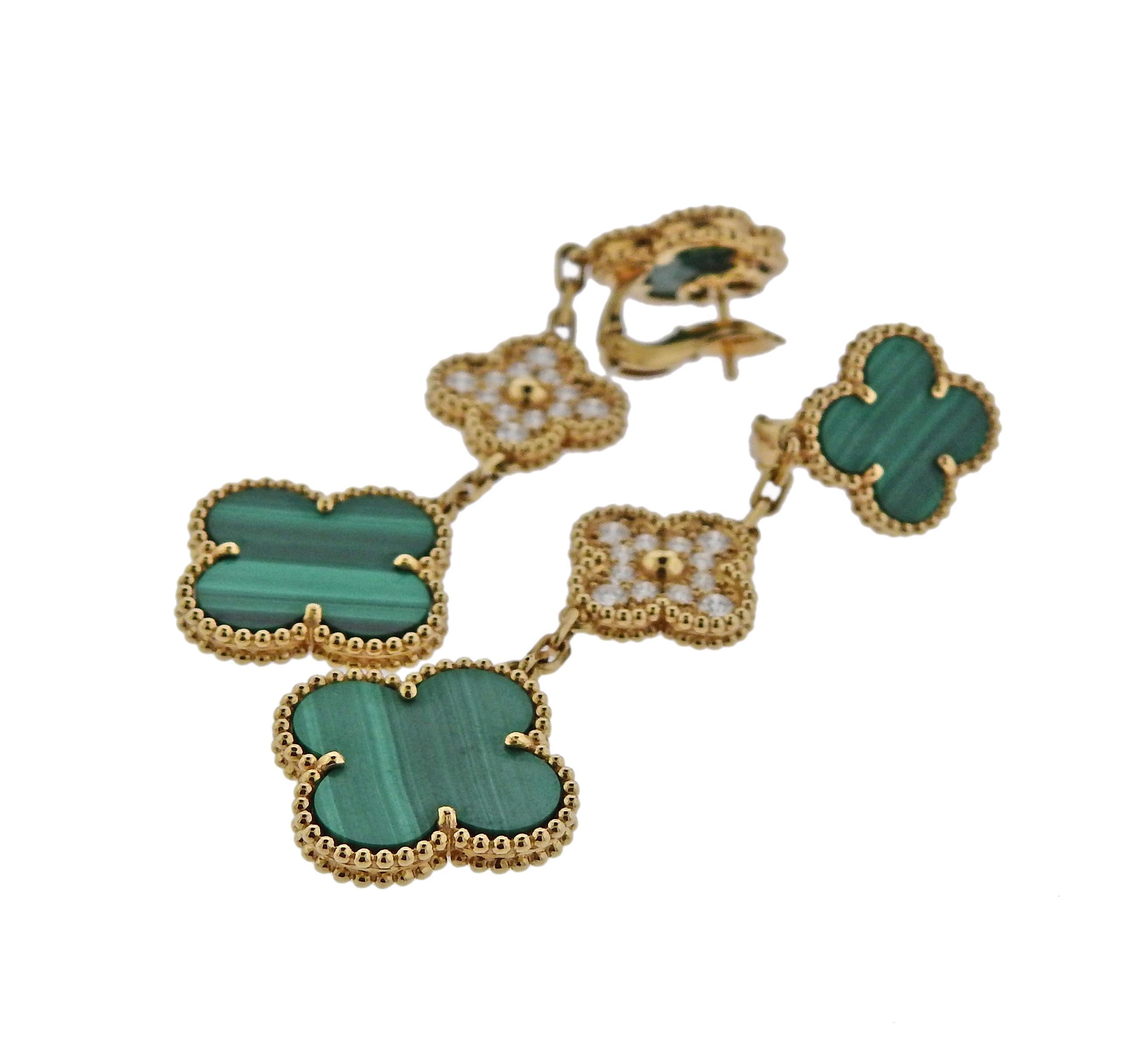 Pair of iconic 18k gold Magic Alhambra earrings by Van Cleef & Arpels, set with 0.96ctw in FG/VVS diamonds and malachite. Retail $16100. Come with box and COA. Earrings are 68mm long, bottom motifs are 20mm x 20mm and weigh 21 grams. 