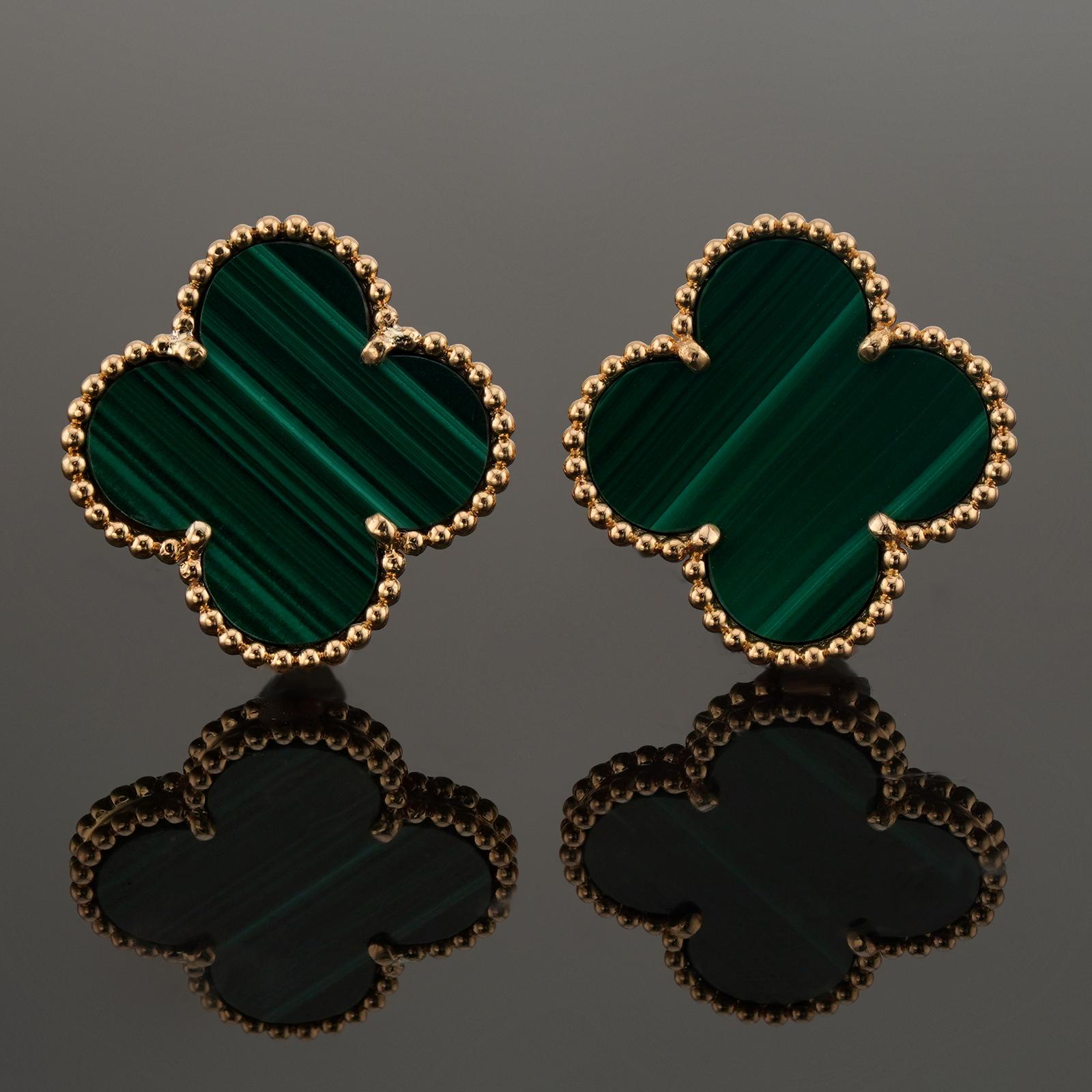 These rare Van Cleef & Arpels earrings from the iconic Magic Alhambra collection are crafted in 18k yellow gold and feature a pair of lucky clover motifs inlaid with green malachite in round bead settings. Made in France circa 2000s. Measurements: