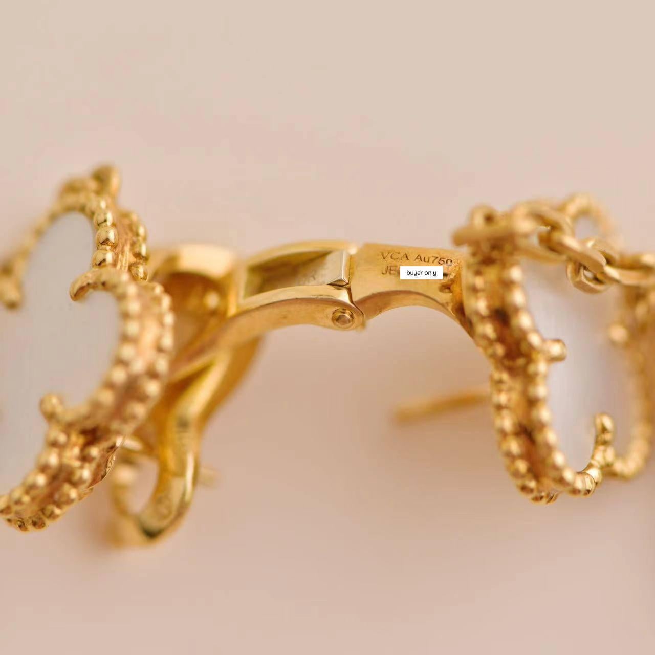 Women's or Men's Van Cleef & Arpels Magic Alhambra Long Mother of Pearl Yellow Gold Earrings