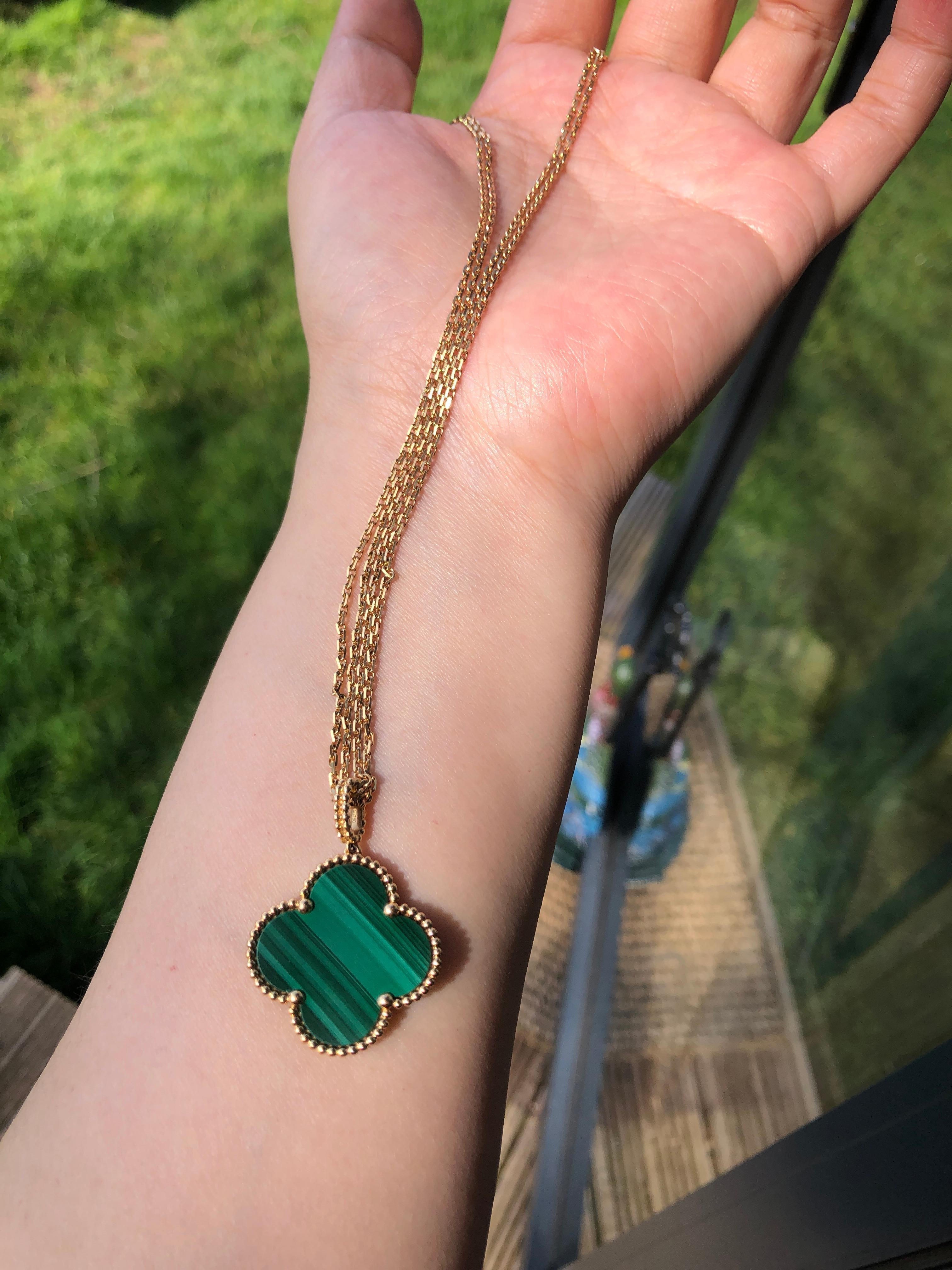 Gorgeous authentic rare and highly collectible Van Cleef & Arpels Magic Alhambra Malachite pendant necklace made in 2016. This piece comes with an original pouch and authentic card.

STONES
Malachite

METAL TYPE 
18K Yellow Gold

WEIGHT
Appro: