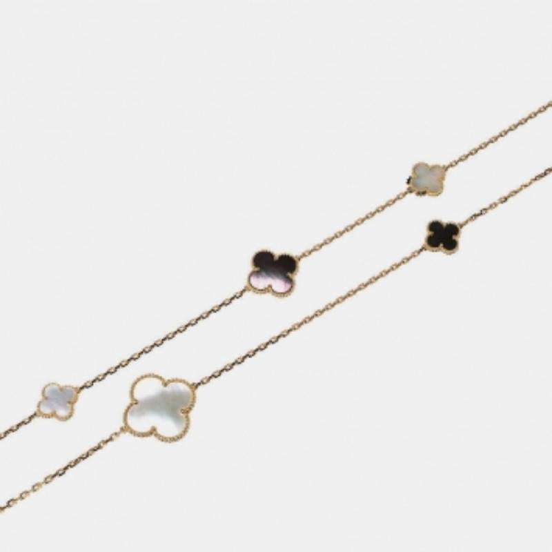 The Van Cleef & Arpels Magic Alhambra creations, born in 2006, gather different-sized Alhambra motifs and form incredible jewelry pieces. It is made of 18k yellow gold, and the five motifs are set with mother of pearl and onyx