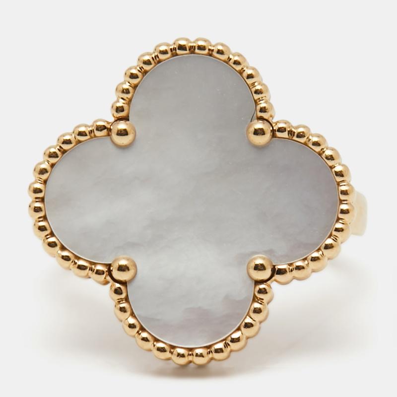 This lovely Van Cleef & Arpels Magic Alhambra ring reflects the mastery and precision that goes into making a VC jewel. Made from 18K yellow gold, the ring has the clover-leaf motif laid with mother of pearl.

Includes: Photocopy of Invoice