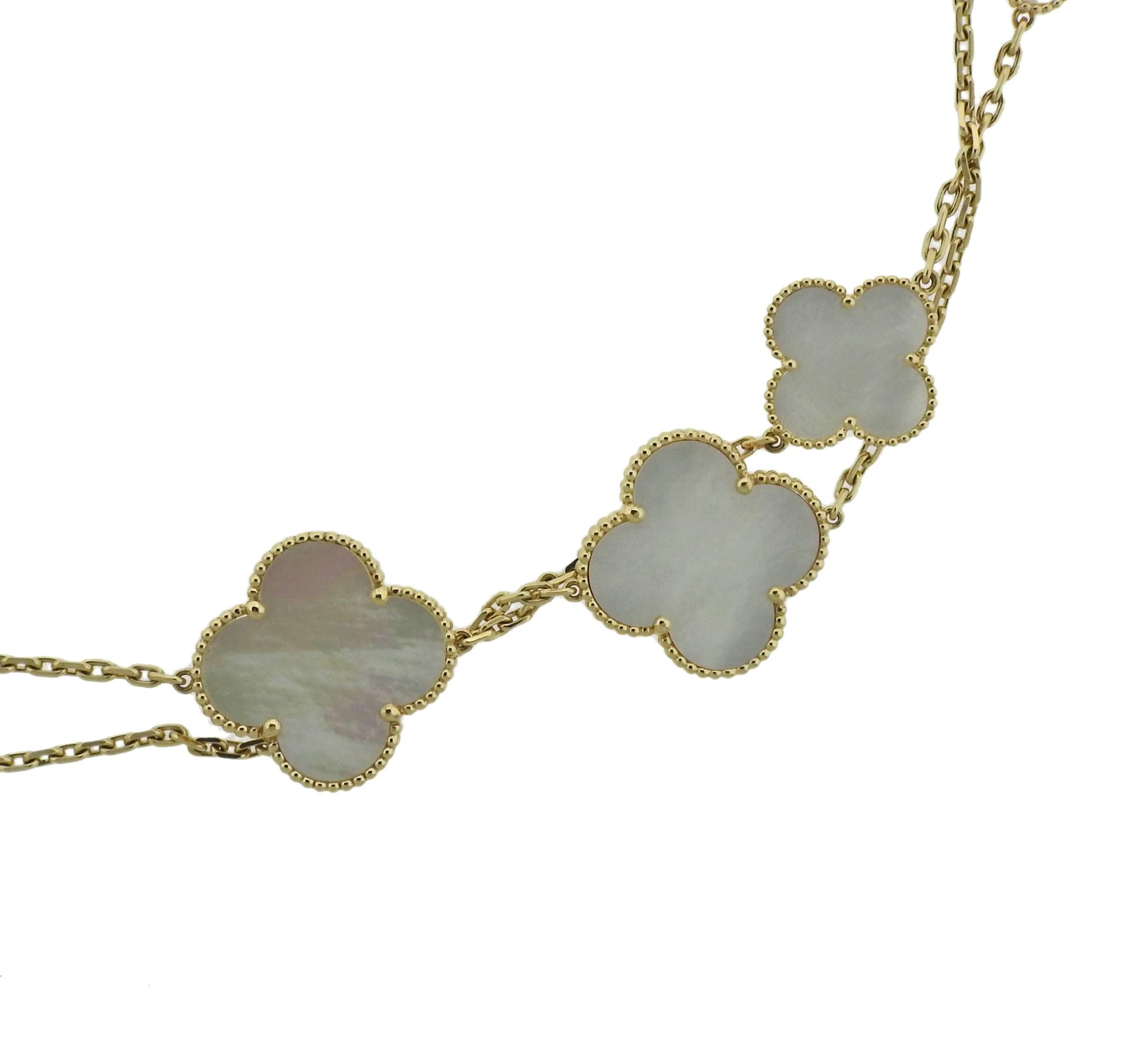 Iconic Magic Alhambra necklace, featuring 16 mother of pearl multi size motifs, crafted in 18k gold by Van Cleef & Arpels. Retail $23100. Comes with COA and pouch. Necklace is 49