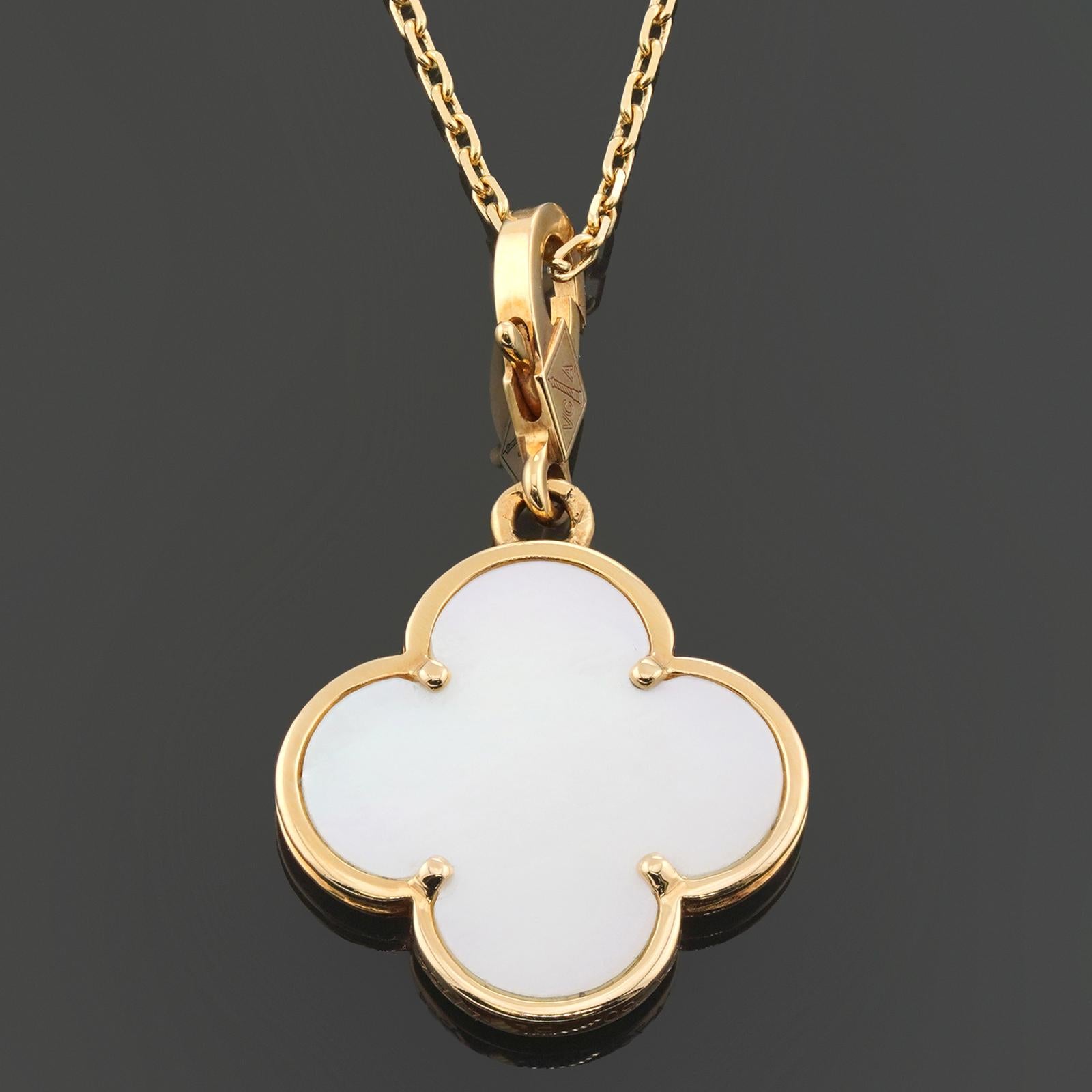 This elegant Van Cleef & Arpels necklace from the classic Magic Alhambra collection features an extra large beaded lucky clover pendant crafted in 18k yellow gold and set with white mother-of-pearl. Made in France circa 1990s.  Measurements: 0.86