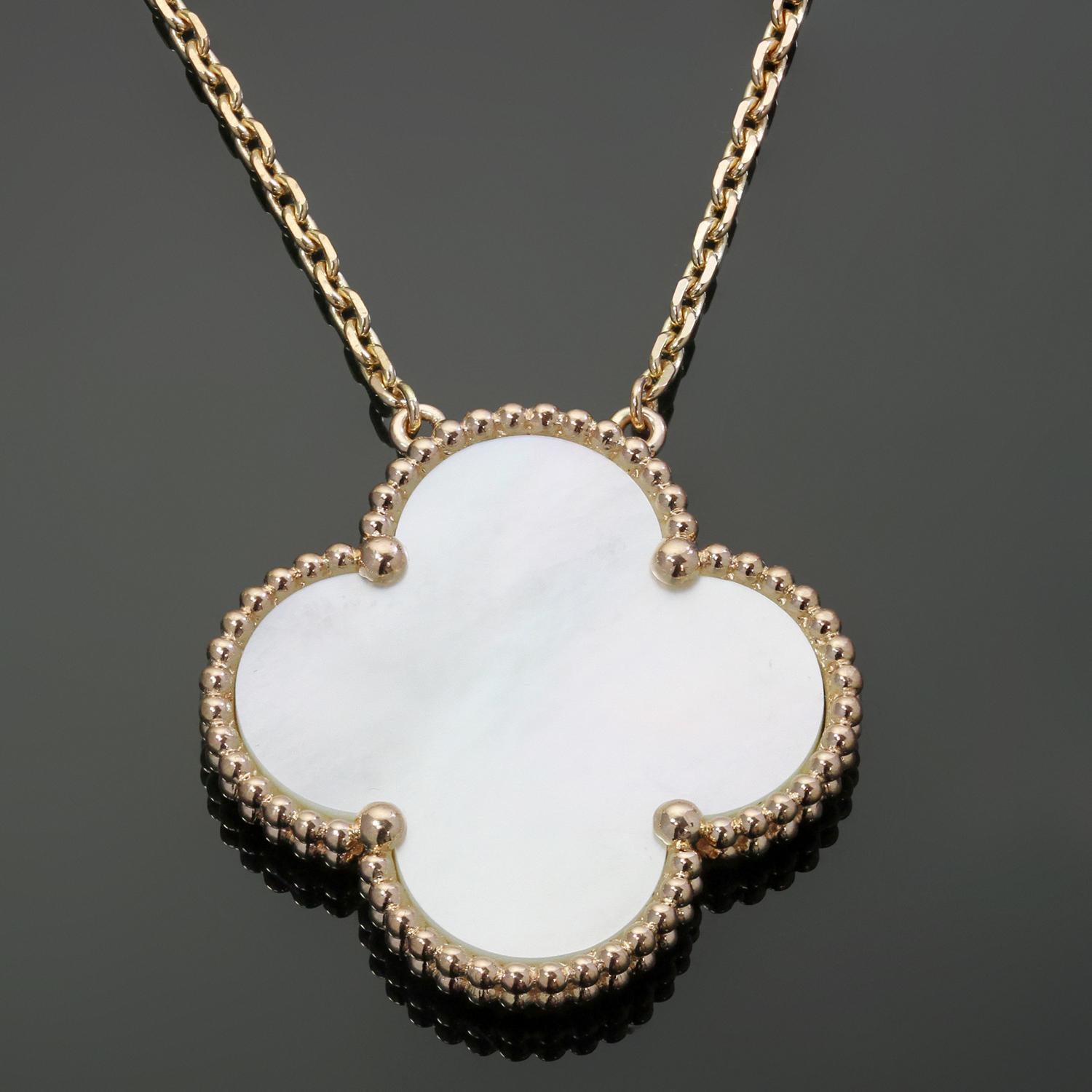 This elegant Van Cleef & Arpels necklace from the classic Magic Alhambra collection features an extra large beaded lucky clover pendant crafted in 18k rose gold and set with white mother-of-pearl. Made in France circa 2000s. Measurements: 1.02