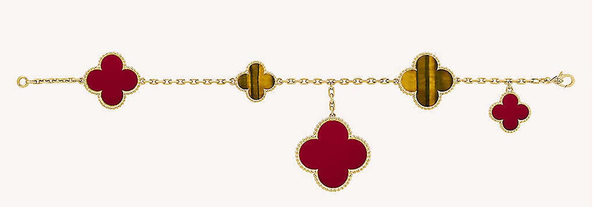Magic Alhambra bracelet, 5 motifs, yellow gold, tiger's eye, carnelian.

VCA187
Reference : VCARN5JQ00
Item come with a box and paper

