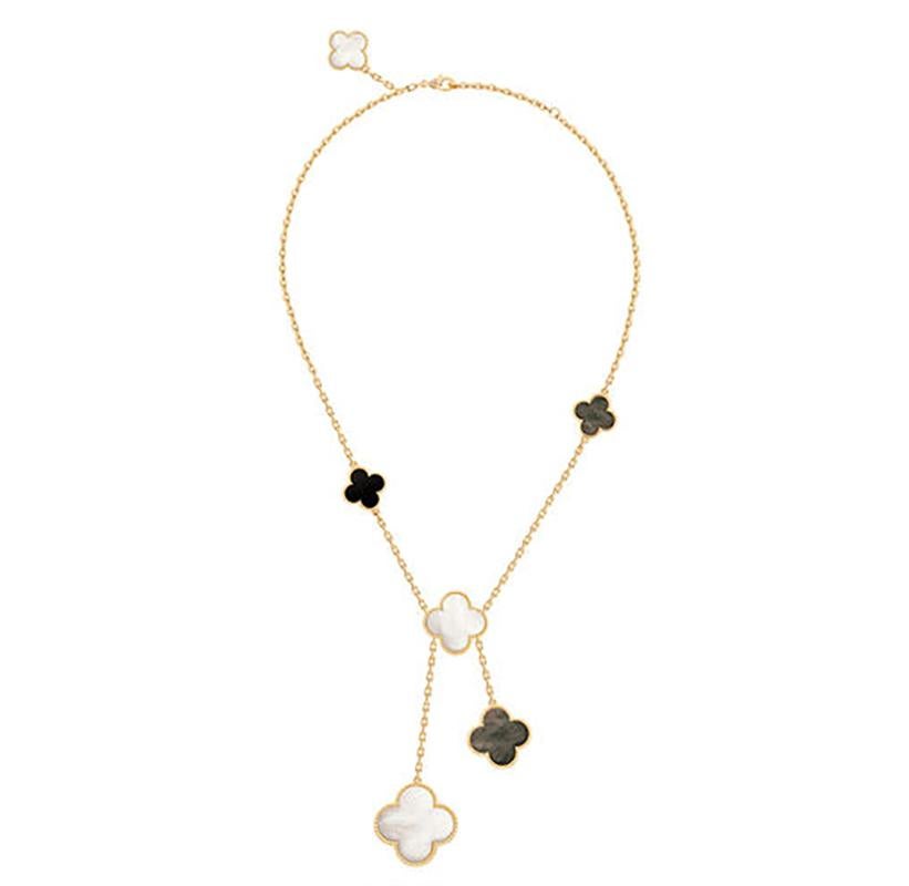 Created in 2006 by Van Cleef & Arpels, the Magic Alhambra(R) jewelry creations gather different-sized Alhambra motifs, coming together in a joyful dance. Inspired by the clover leaf, their asymmetric designs feature different associations of