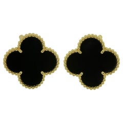Van Cleef & Arpels Boucles d'oreilles Magic Alhambra en or jaune et onyx