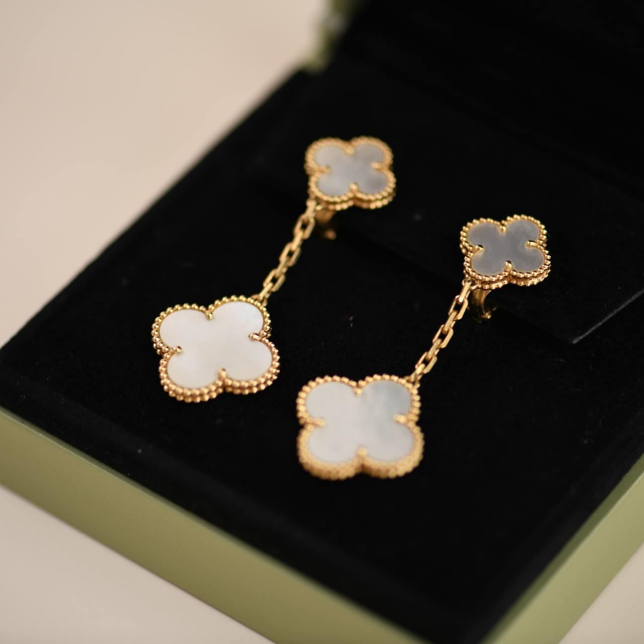 Van Cleef & Arpels Magic Alhambra Two Motif Mother of Pearl Yellow Gold Earrings In Excellent Condition In Banbury, GB