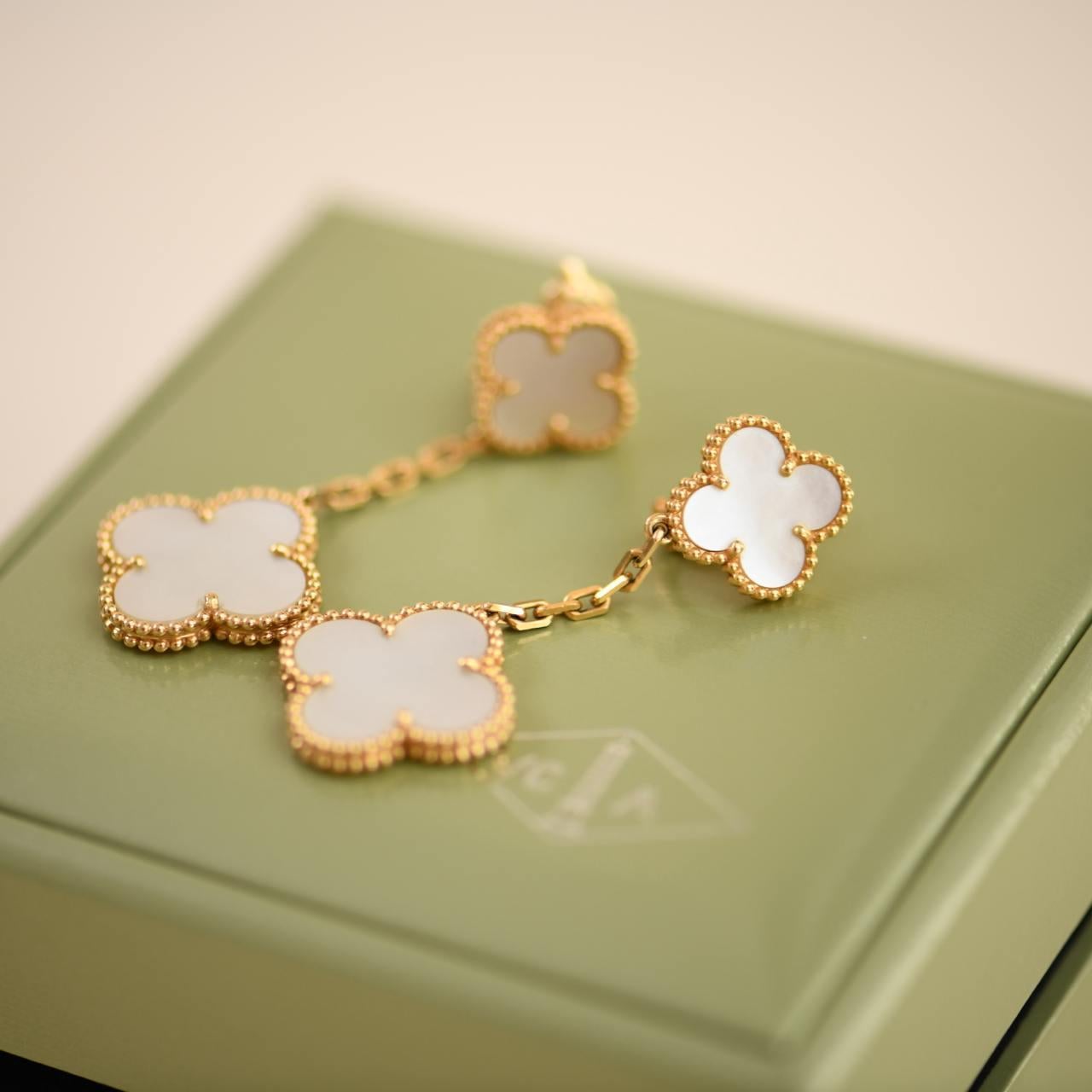 Women's or Men's Van Cleef & Arpels Magic Alhambra Two Motif Mother of Pearl Yellow Gold Earrings