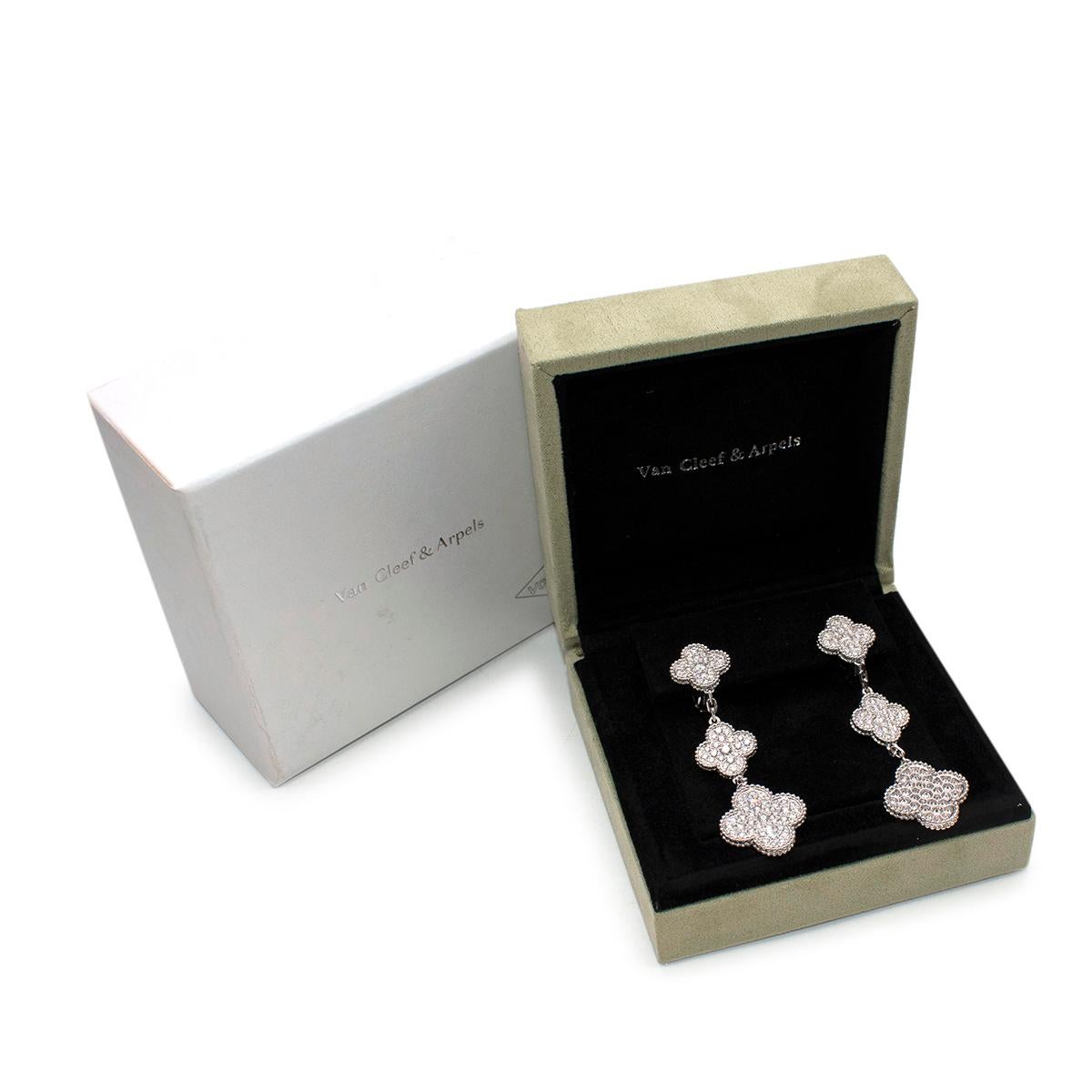 Van Cleef & Arpels Magic Alhambra White Gold & Diamond Earrings

- Inspired by the clover leaf
- Their asymmetric designs feature different associations of materials
- Three different-sized Alhambra motifs
- Clip system with detachable post white