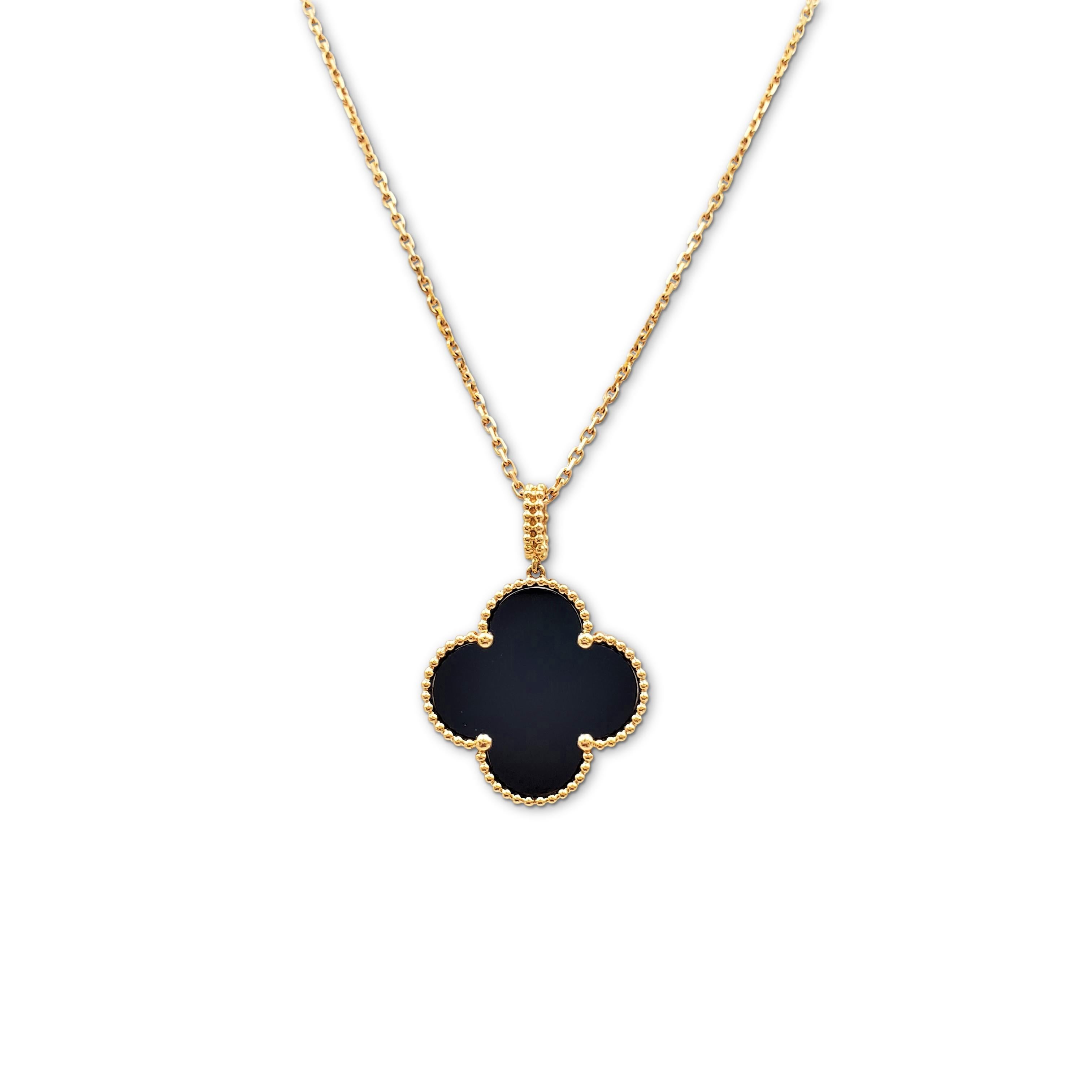 Authentic Van Cleef & Arpels 'Magic Alhambra' pendant necklace crafted in 18 karat yellow gold features a single cloverleaf inspired motif in onyx. Signed VCA, Au750, with serial number and hallmark. The necklace is presented with the original box