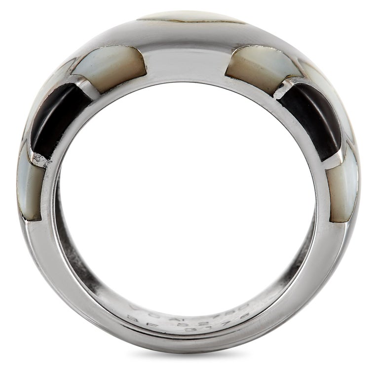Luxurious and edgy at the same time, this Marqueterie Ring will effortlessly bring a chic definition to your looks. It features a semi-domed band measuring 8mm thick, with 3mm top height and 20mm x 12mm top dimensions. The ring is fashioned from 18K