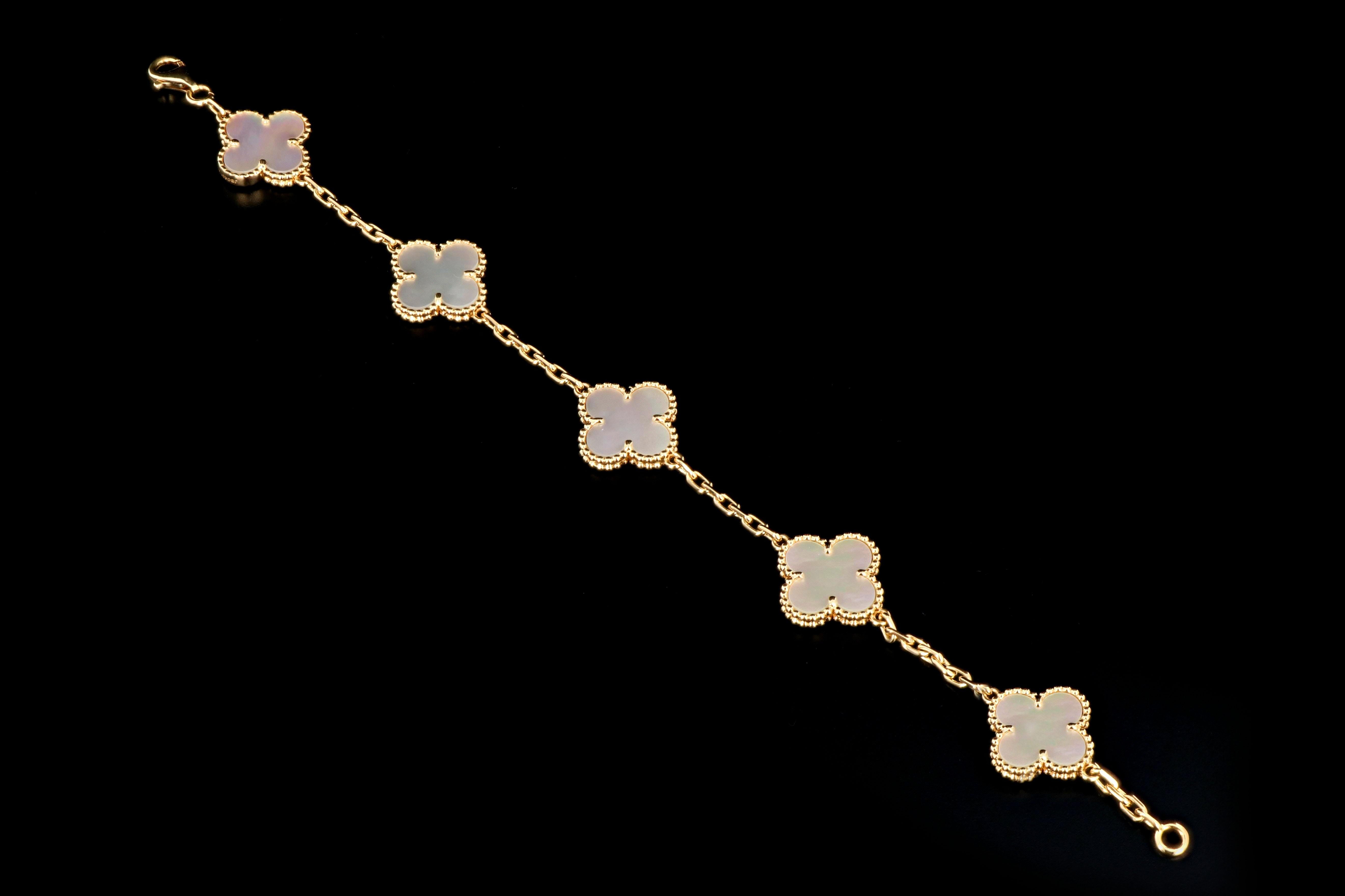 Van Cleef & Arpels Mother of Pearl Alhambra 18 Karat Gold 5 Motifs Bracelet In Excellent Condition In Cape May, NJ