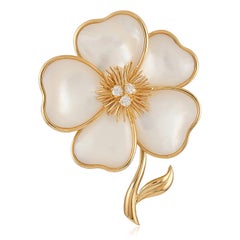 VAN CLEEF & ARPELS Mother-of-Pearl and Diamond Flower Brooch and Ear Clips