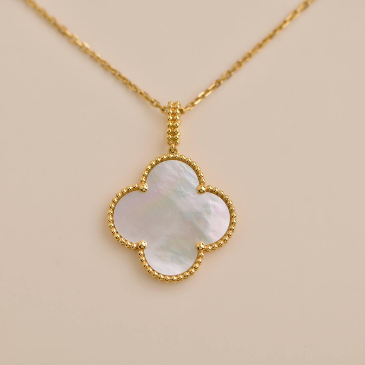 Van Cleef & Arpels Mother of Pearl Magic Alhambra Yellow Gold Pendant Necklace In Excellent Condition In Banbury, GB