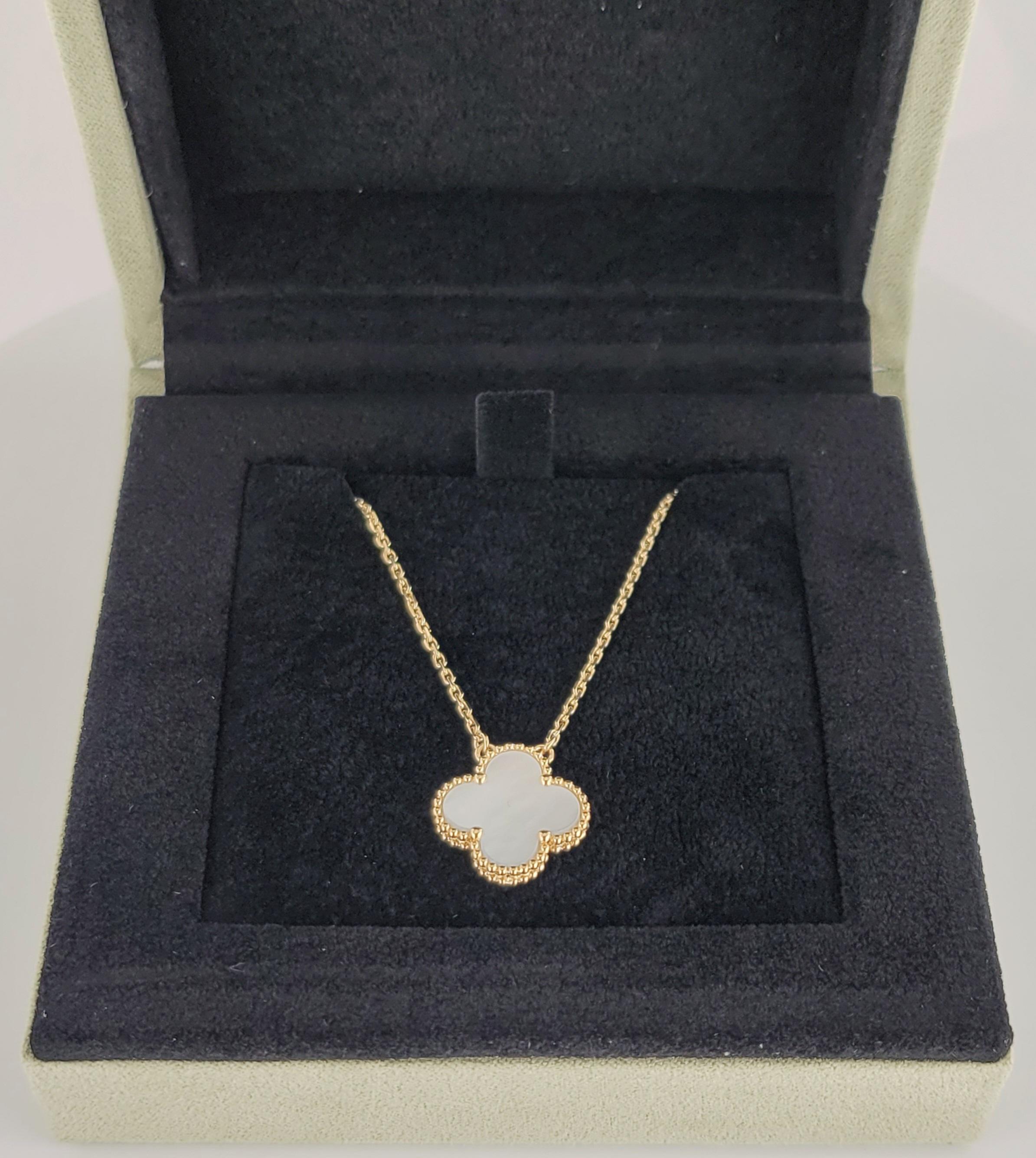 Brand Van Cleef Arpels 
Mint Condition 
18K Yellow Gold Mother of pearl 
Gender women
Chain length 18'' Long 
Adjustable 18'' 16''
Motif dimension 15mm
Motif  width 2.5mm
Comes with Van Cleef Pendant box