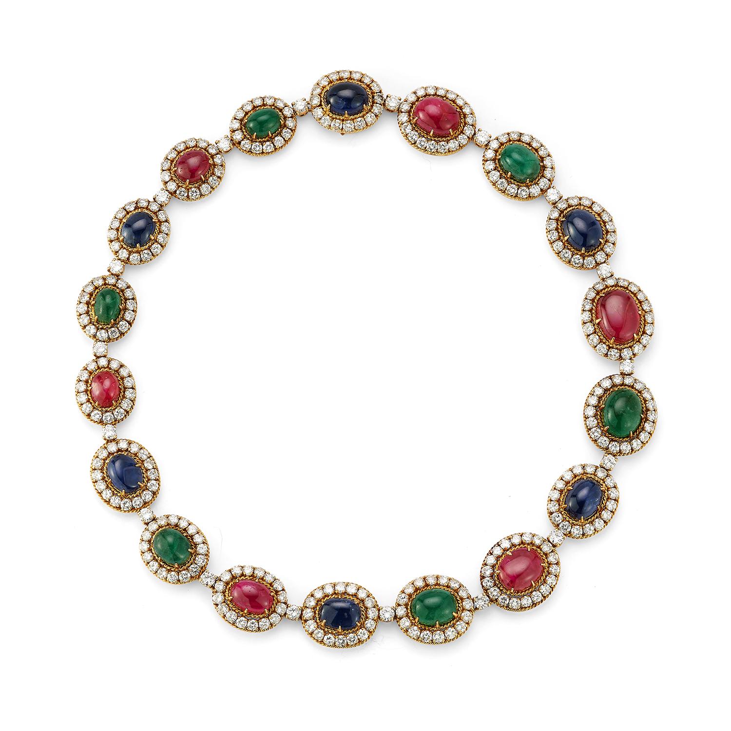 Van Cleef and Arpels Multigem Necklace and Bracelet Set

This resplendent set of Van Cleef & Arpels multi-gem 'Médaillon' jewelry exudes timeless elegance and opulence. Comprising a necklace and bracelet crafted in 18k yellow this 1989 creation