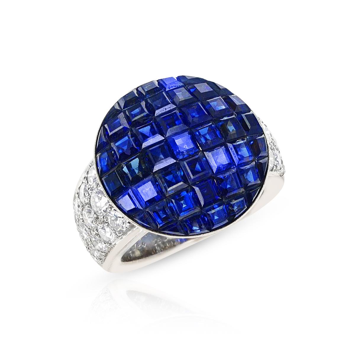 A Van Cleef & Arpels Mysery Set Sapphire Ring with Diamonds, 18k. The ring size is US 5.50. The diamond weight is appx. 1.20 carats. The total weight of the ring is 13.40 grams. 