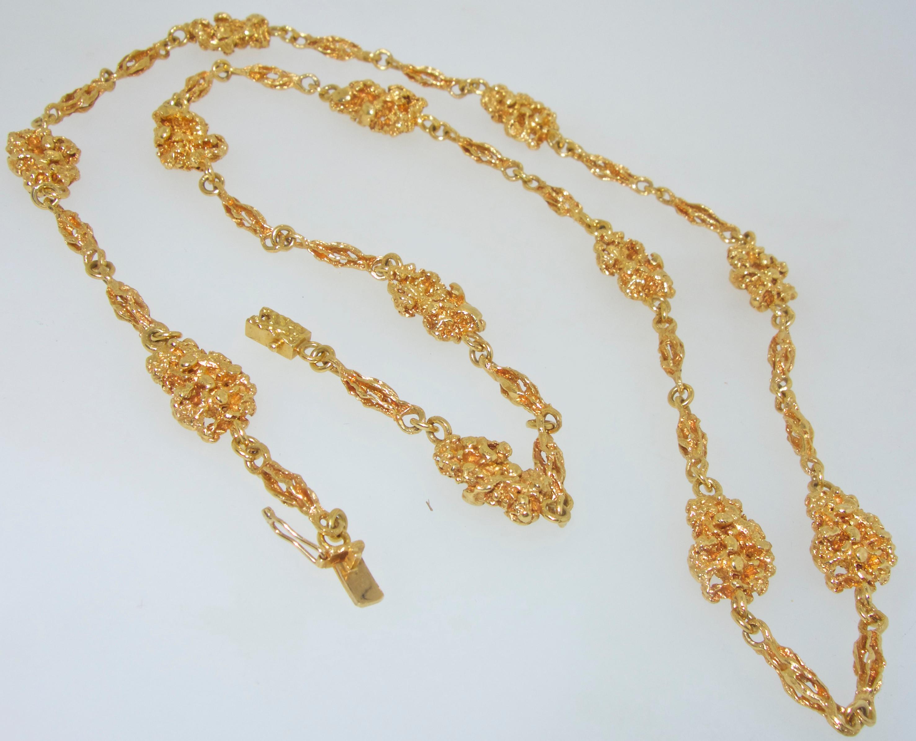 Van Cleef & Arpels gold nugget long necklace.  Signed and numbered, this 30 inch Van Cleef & Arpels necklace chain was probably made about the same time as their classic and iconic hand-hammered cuff bracelets when the world famous jewelry house was