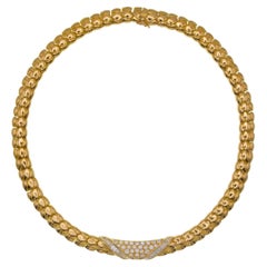 Van Cleef & Arpels  Collier avec accents de diamants.
