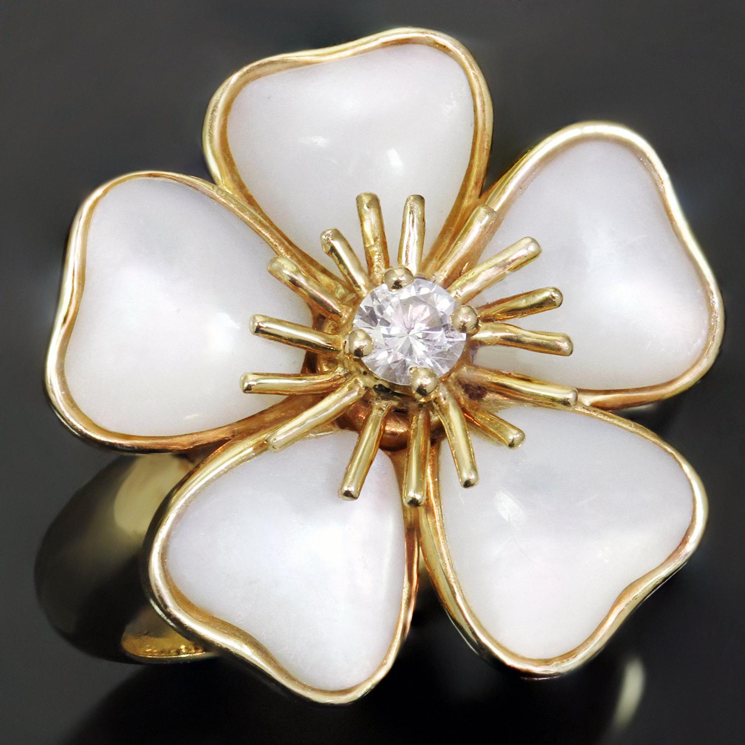 This fabulous Van Cleef & Arpels ring from the classic Nerval collection features a delicate flower design crafted in 18k white gold and accented with white mother-of-pearl petals and a brilliant-cut round D-F VVS1-VVS2 diamond. Made in France circa