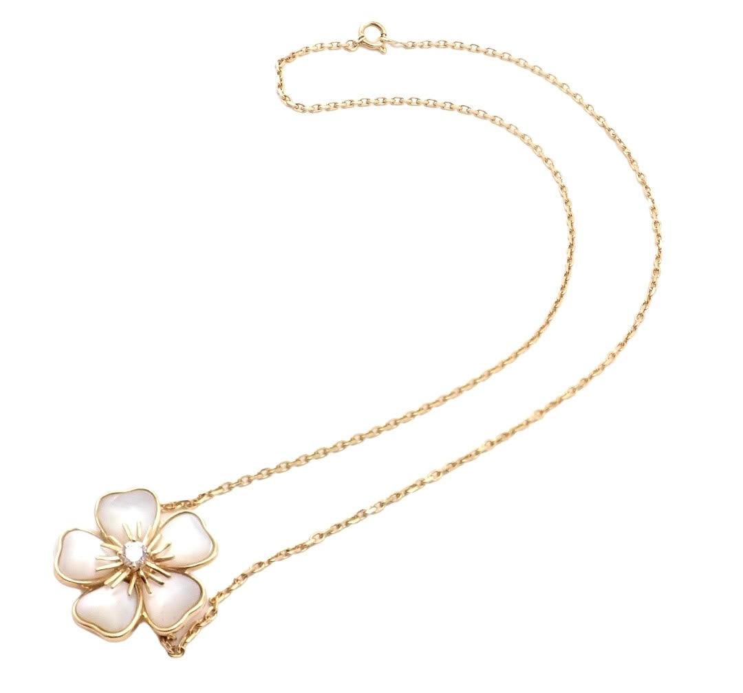 18k Yellow Gold Nerval Mother of Pearl Diamond Flower Pendant Necklace  by Van Cleef & Arpels. 
With 1 Round Brilliant Cut Diamond VS1 clarity, F color total weight approx. .15ct

Details:
Length: 15