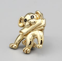 Van Cleef & Arpels Onyx 18k Gold Dog with Newspaper Brooch