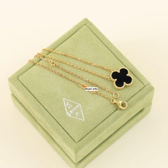 Van Cleef & Arpels Onyx Alhambra Pendant Necklace