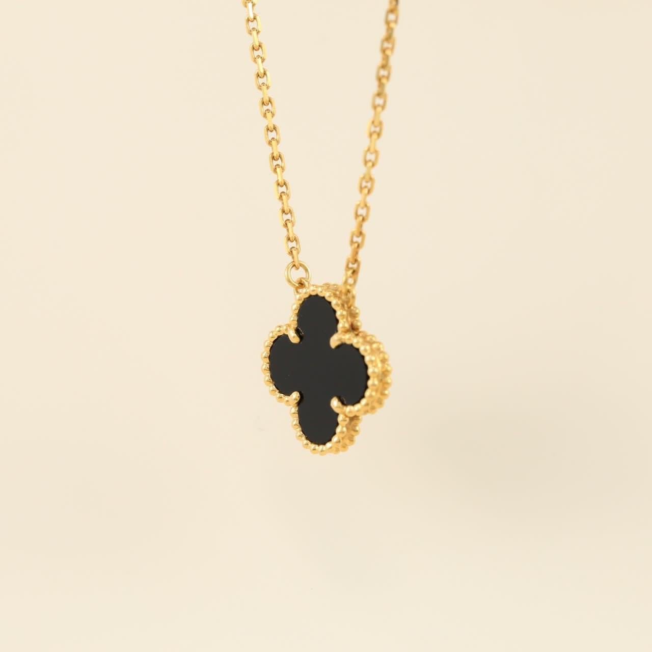 Van Cleef & Arpels Onyx Alhambra Pendant Necklace In Excellent Condition In Banbury, GB