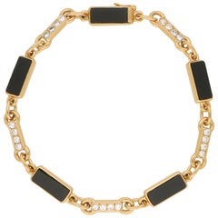 Van Cleef & Arpels Onyx and Diamond Chain Bracelet in 18 Karat Yellow Gold