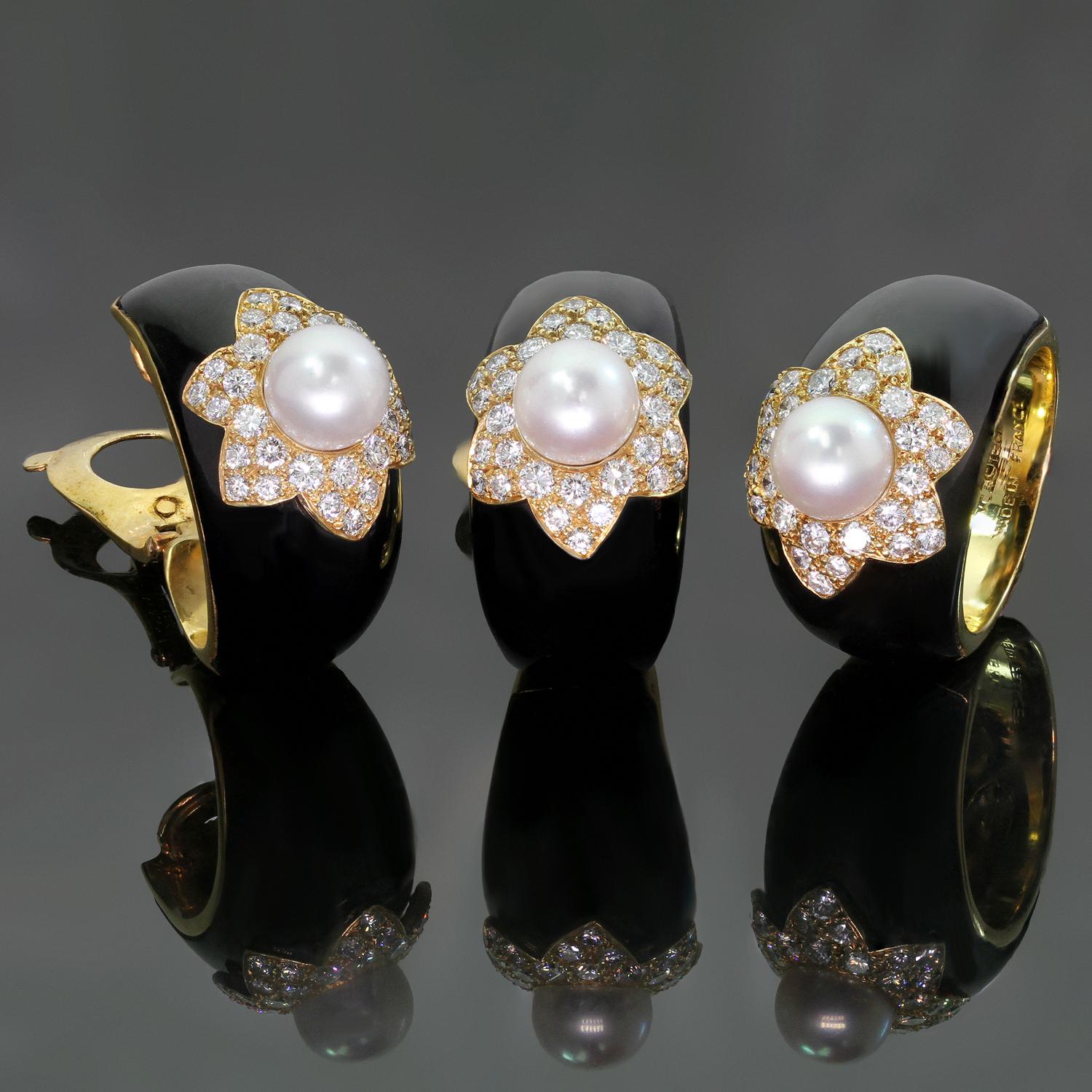 This spectacular Van Cleef & Arpels earrings & ring set are crafted in 18k yellow fold, inlaid with black onyx with 7.0mm cultured pearls in the center - white, clean, and very shiny, surrounded by a floral pave of brilliant-cut round D-F VVS1-VVS2
