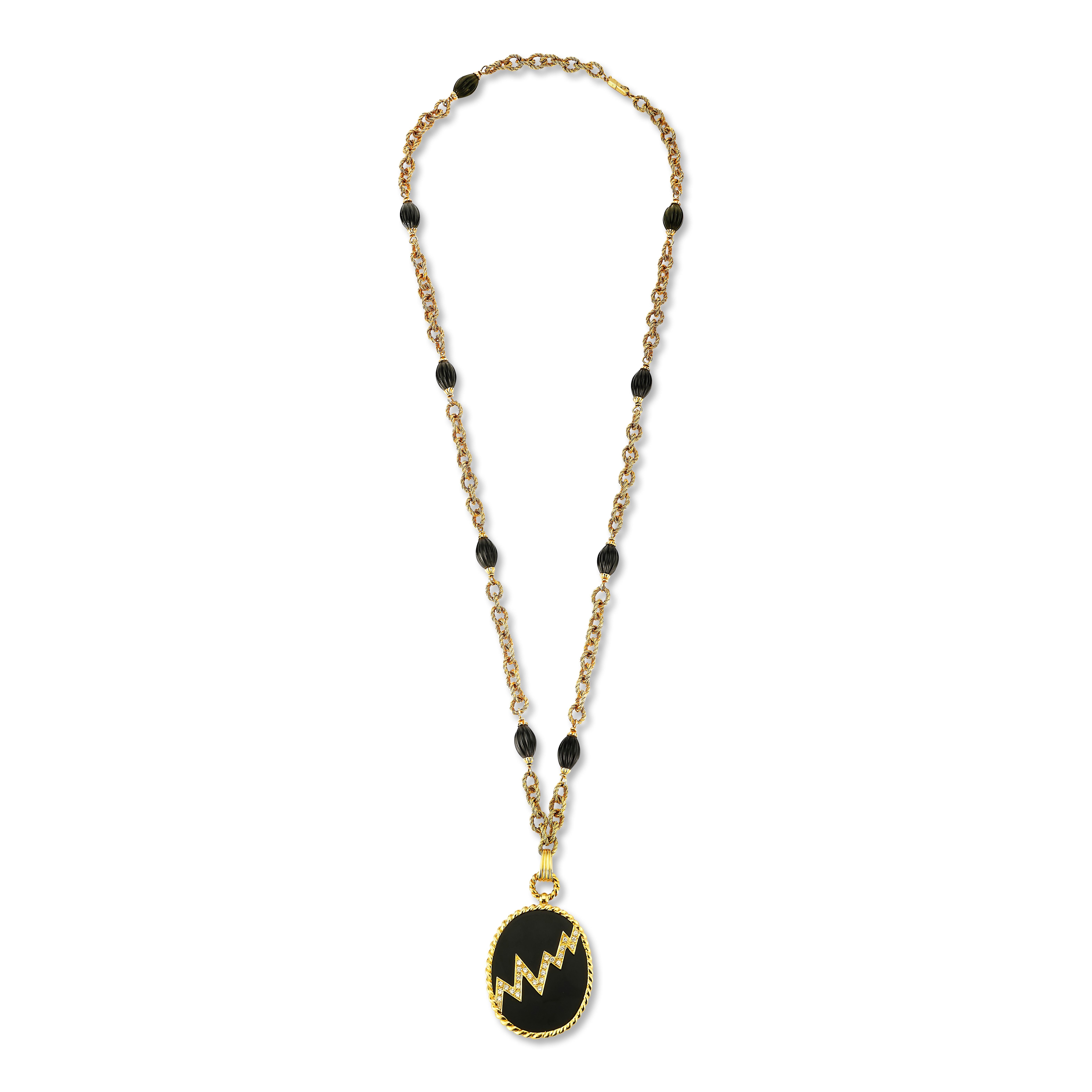 Van Cleef & Arpels Onyx & Diamond Sautoir Necklace

This exquisite Van Cleef & Arpels Onyx Necklace is a stunning vintage piece from the 1970s. The necklace features a beautiful combination of black onyx beads and gold accents, which perfectly