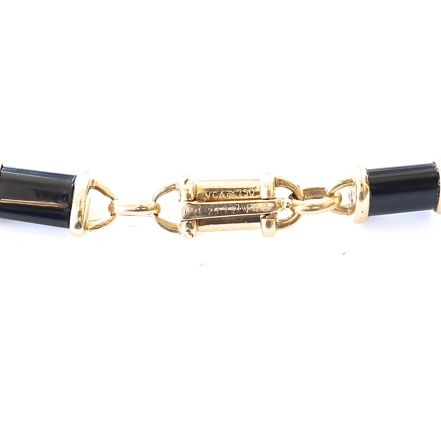  VCA has created a well thought out interchangeable necklace bracelet. Practical and oh so beautiful. Crafted in links of onyx and 18k gold that create two bracelets or just the necklace. Singed VCA, numbered and stamped with French hallmarks.