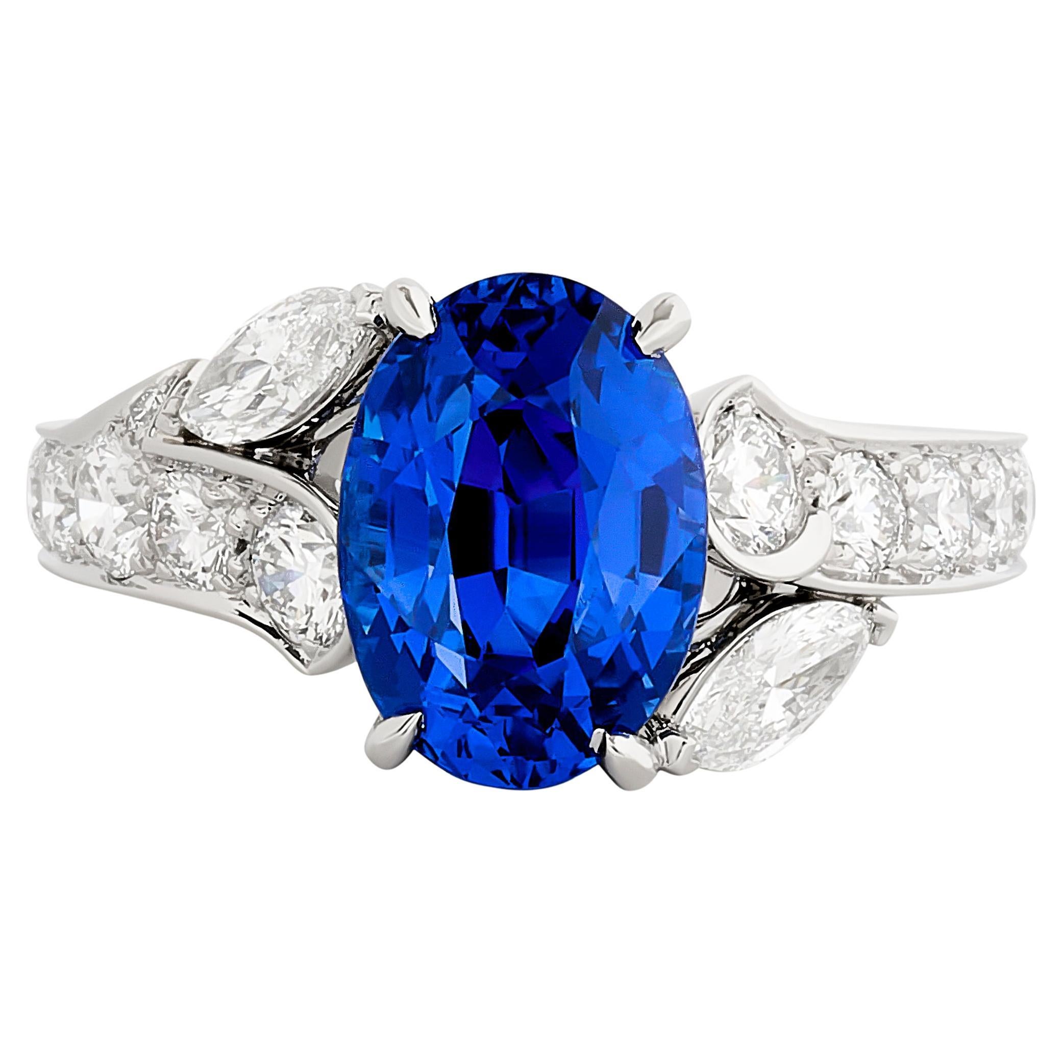 Van Cleef & Arpels Oval Sapphire and Diamond Bypass Ring in Platinum For Sale