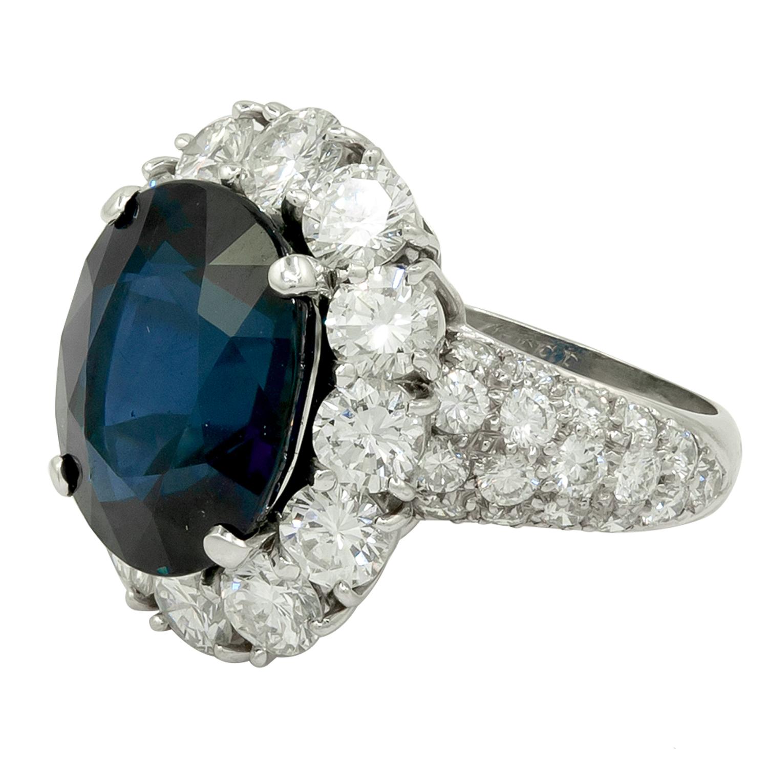 VAN CLEEF & ARPELS Oval-Shaped Sapphire, Diamond Ring
A platinum ring, set with Thailand oval-shaped sapphire, and round brilliant-cut diamonds.
Thailand sapphire weight approx. 10.28 cts. with  AGL certificate
Signed “VAN CLEEF & ARPELS“; circa