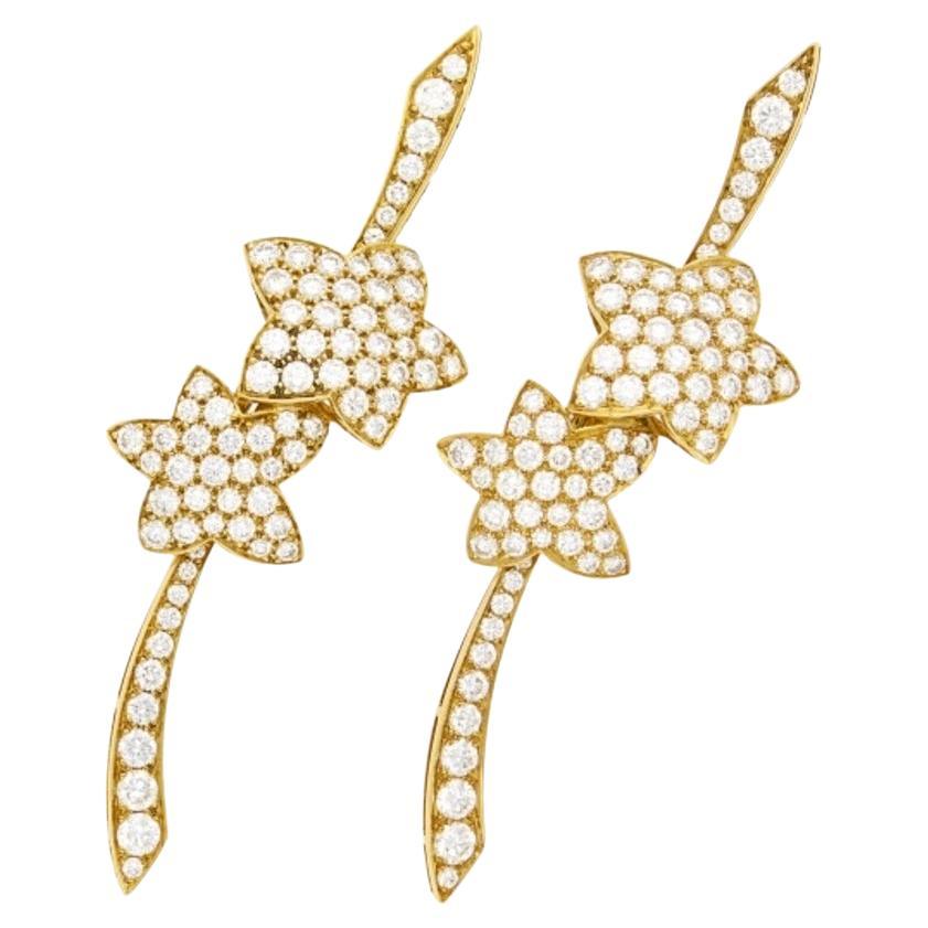 Van Cleef & Arpels Pair of Gold and Diamond Star Pins For Sale