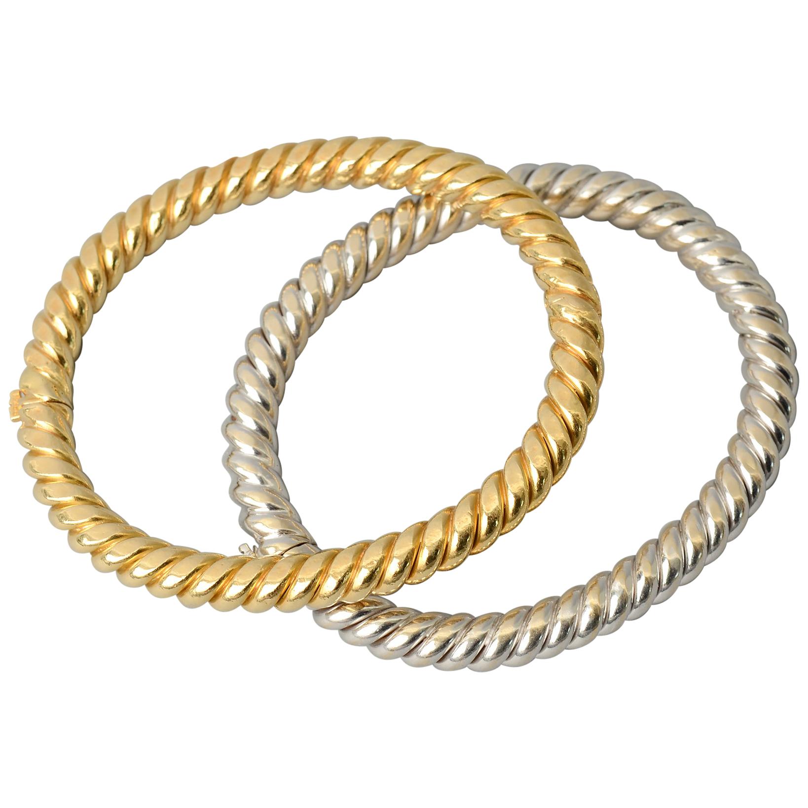 Van Cleef & Arpels Pair of Yellow and White Twisted Gold Bangle Bracelets