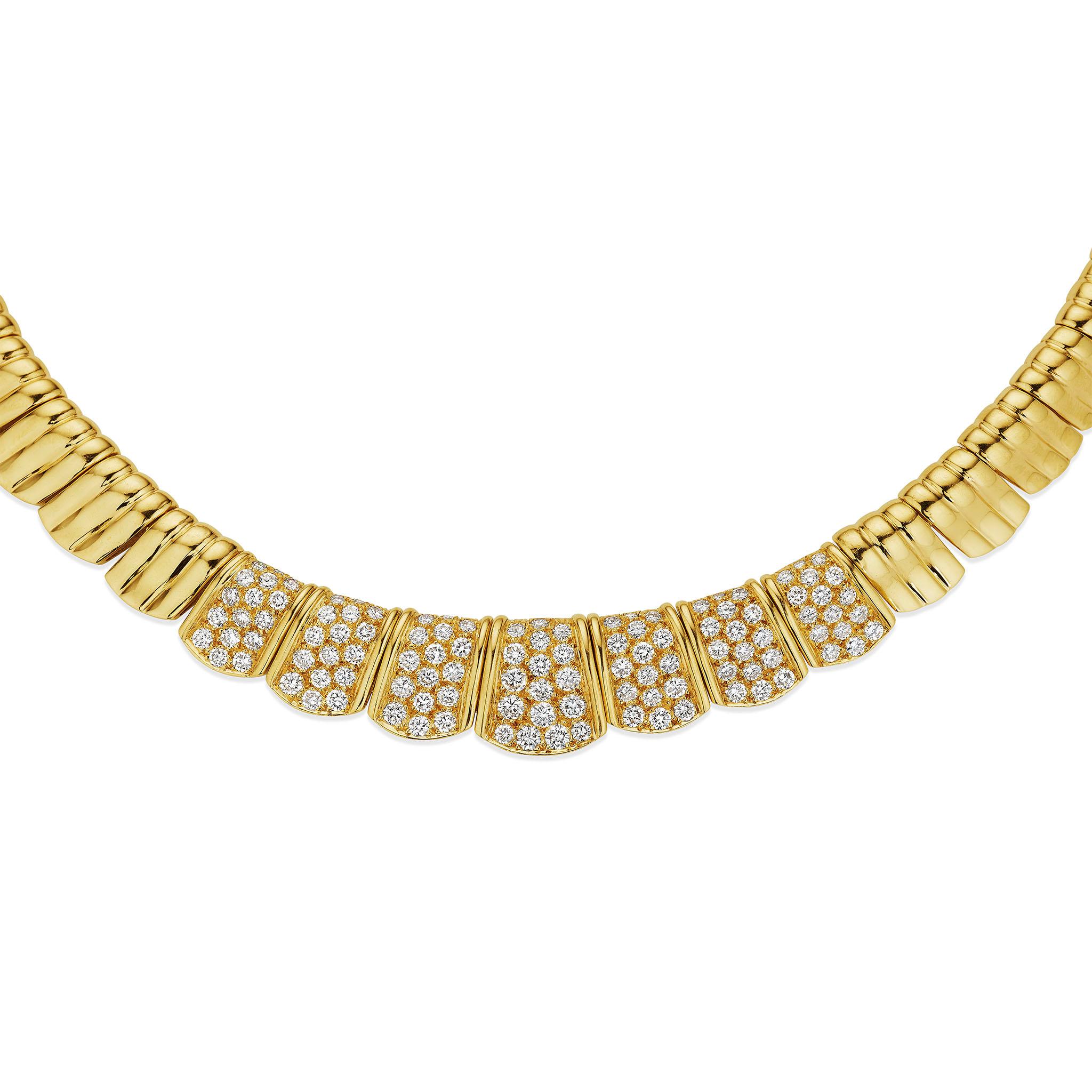 Created in the 1980s by the atelier of Roger Mathon for Van Cleef & Arpels Paris, and retailed in New York, this necklace is composed of 18K gold and diamonds. An evolution in form from the firm's celebrated 
