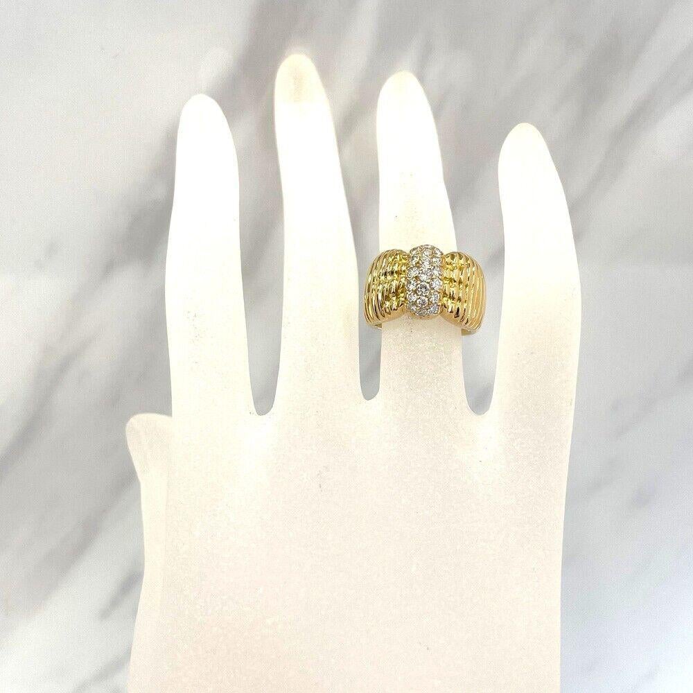 Van Cleef & Arels Paris 18k Yellow Gold & Diamond Bow Ring 1980s Vintage

Here is your chance to purchase a beautiful and highly collectible designer ring.  

Size: US 6, weight: 10.2 g, ring width: approx. 0.24 inches to 0.47 inches
Material K18