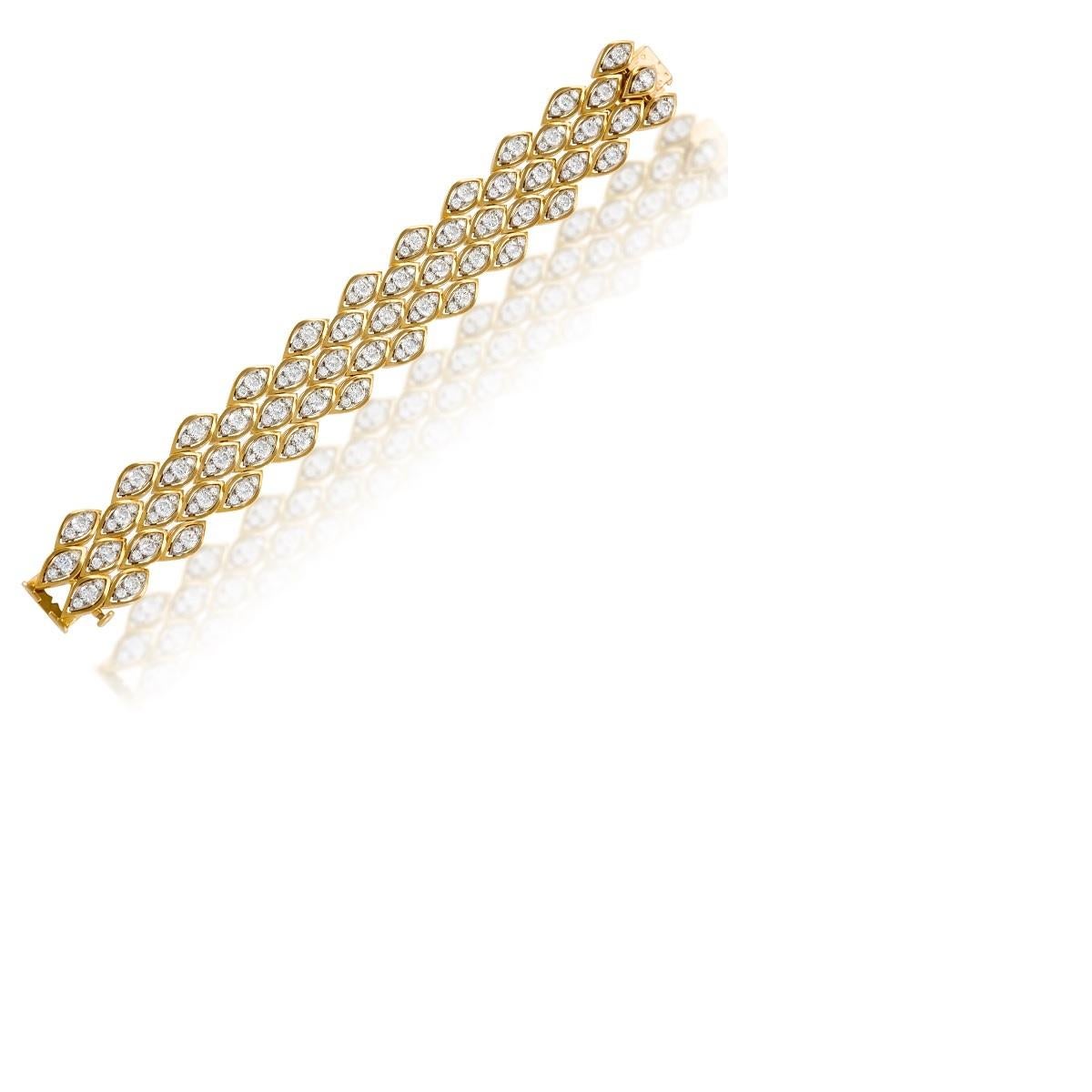 Van Cleef & Arpels Paris 1970s Diamond Gold and Platinum Bracelet In Excellent Condition In New York, NY