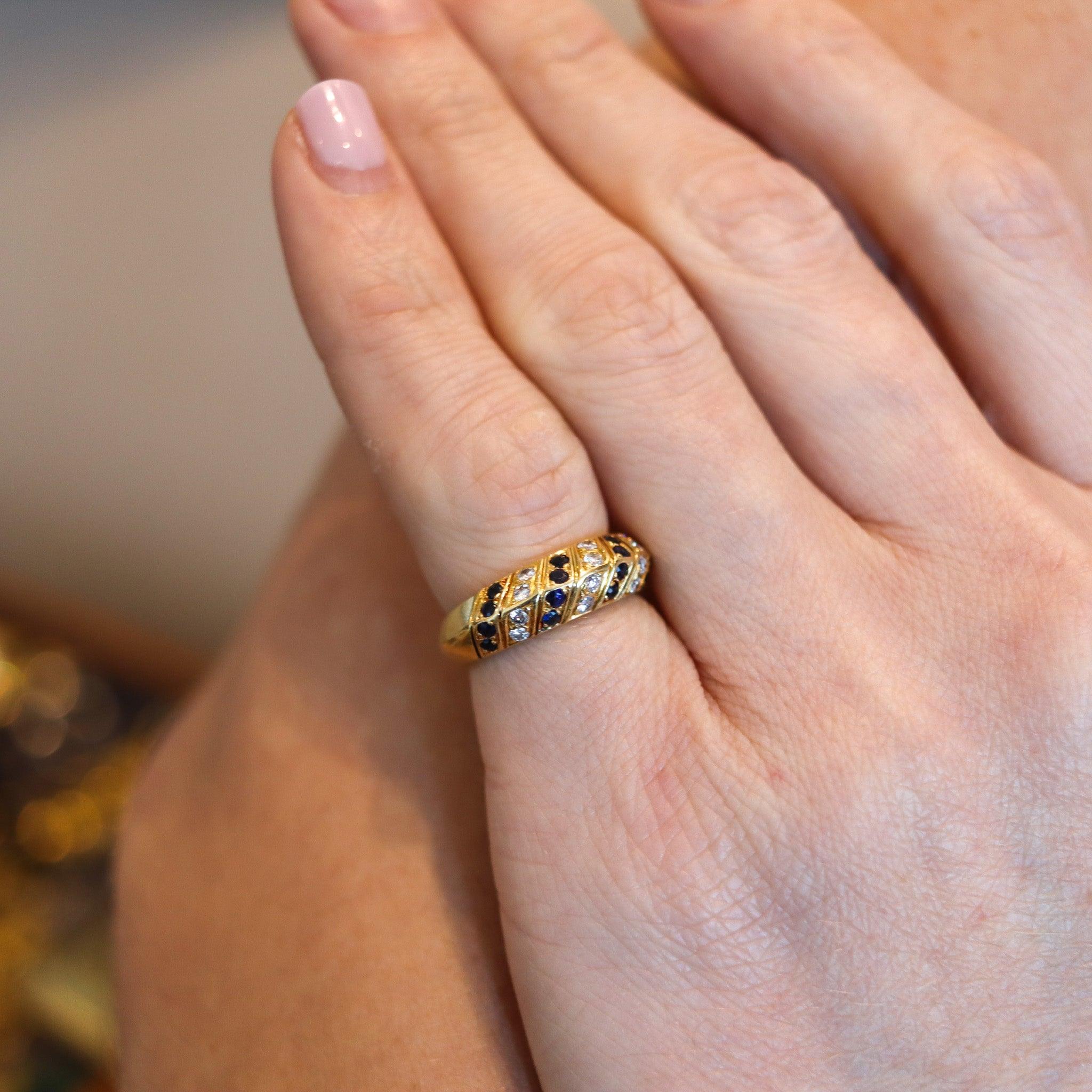 Band ring designed by Van Cleef & Arpels.

This beautiful band ring, was created in Paris France by the iconic jewelry house of Van Cleef & Arpels, back in the 1980. The elegant ring has been crafted in solid yellow gold of 18 karats with high