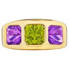 Van Cleef & Arpels Paris Vintage Goldring mit Amethyst im Kissenschliff und Peridot im Kissenschliff